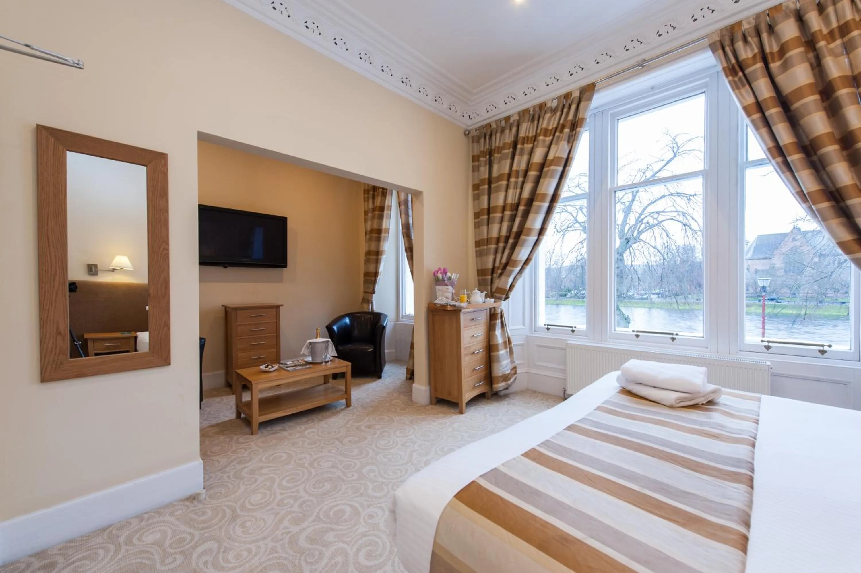 Photo of the whole room, Bed in Glen Mhor Hotel at Uile-bheist 'Brewstillery'