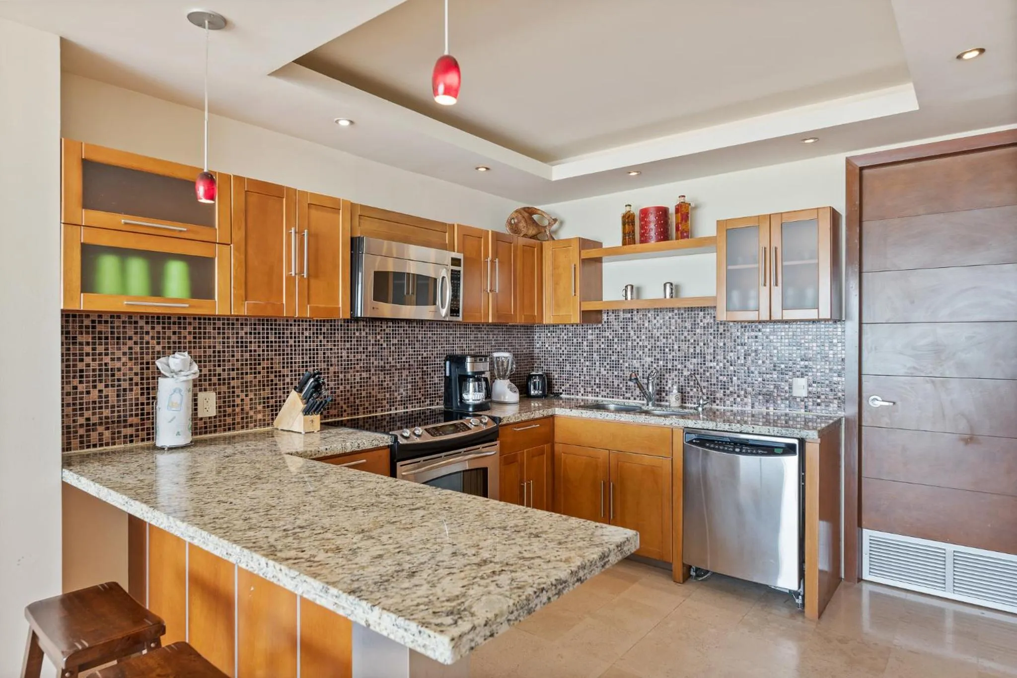 Kitchen or kitchenette in Encanto Living Two Bedroom Unit by Kivoya