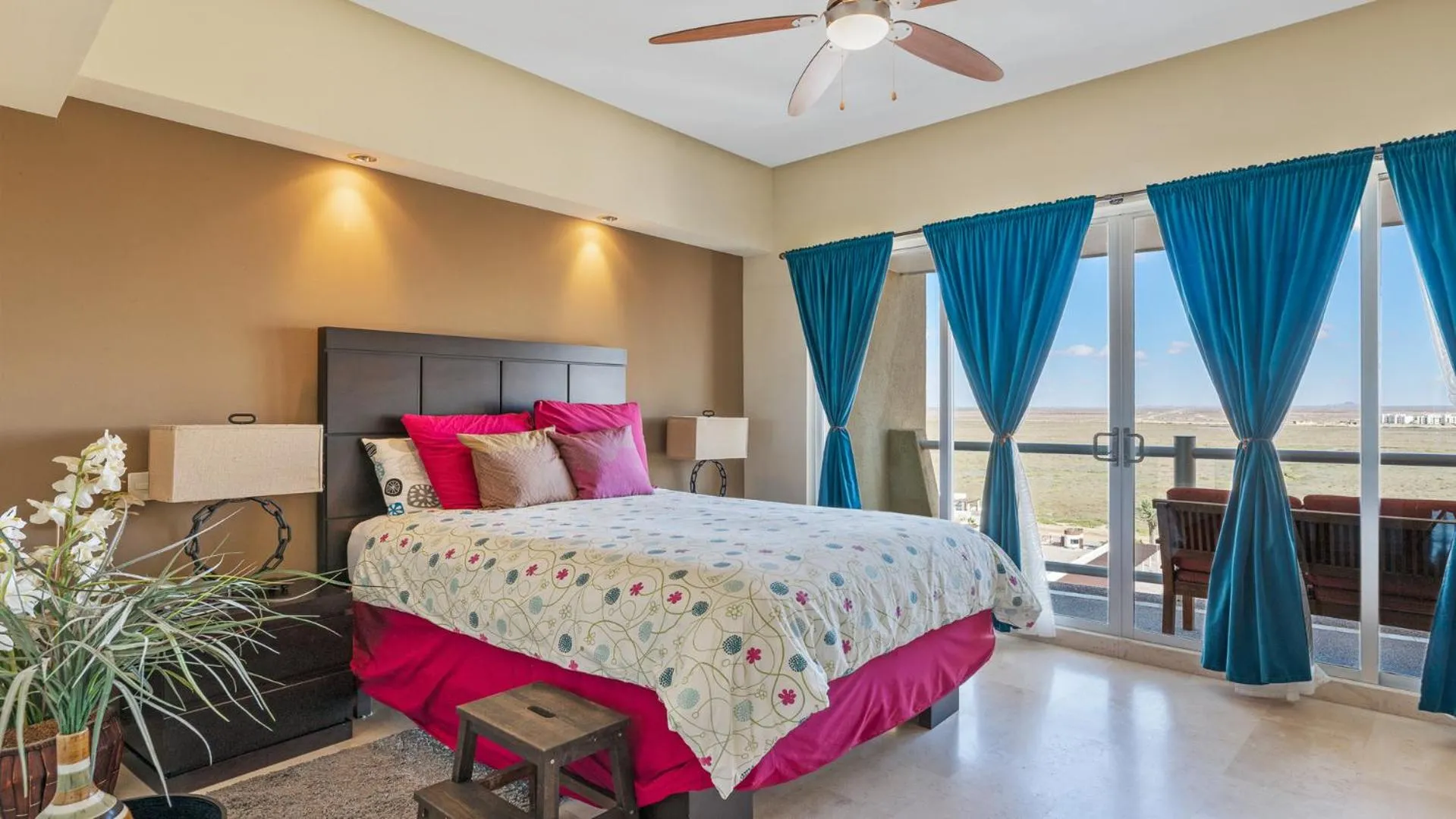 Photo of the whole room, Bed in Encanto Living Two Bedroom Unit by Kivoya