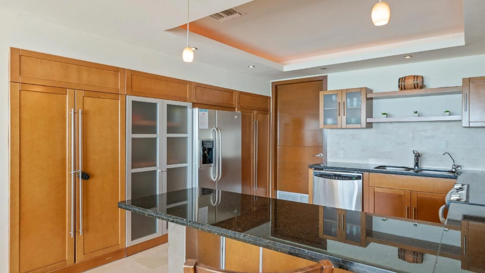 Kitchen or kitchenette in Encanto Living Two Bedroom Unit by Kivoya