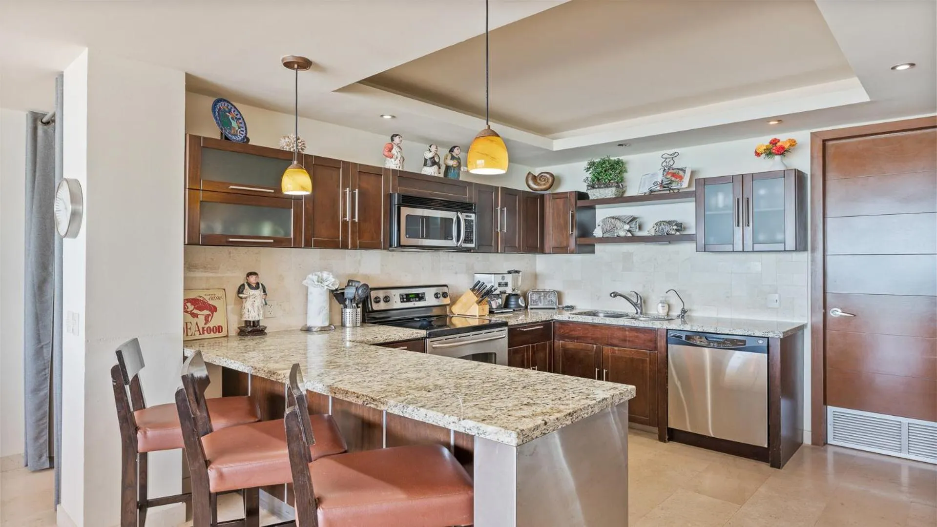 Kitchen or kitchenette in Encanto Living Two Bedroom Unit by Kivoya