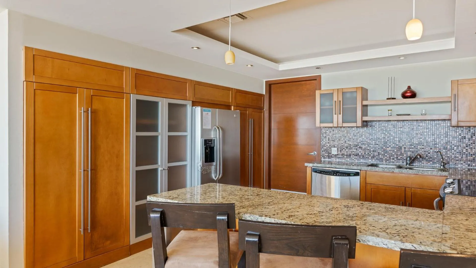 Kitchen or kitchenette in Encanto Living Two Bedroom Unit by Kivoya