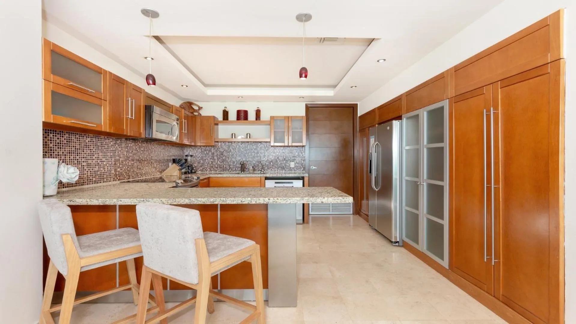 Kitchen or kitchenette in Encanto Living Two Bedroom Unit by Kivoya