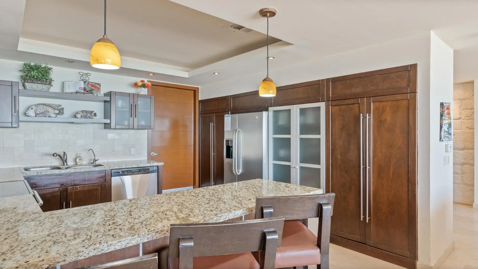 Kitchen or kitchenette in Encanto Living Two Bedroom Unit by Kivoya