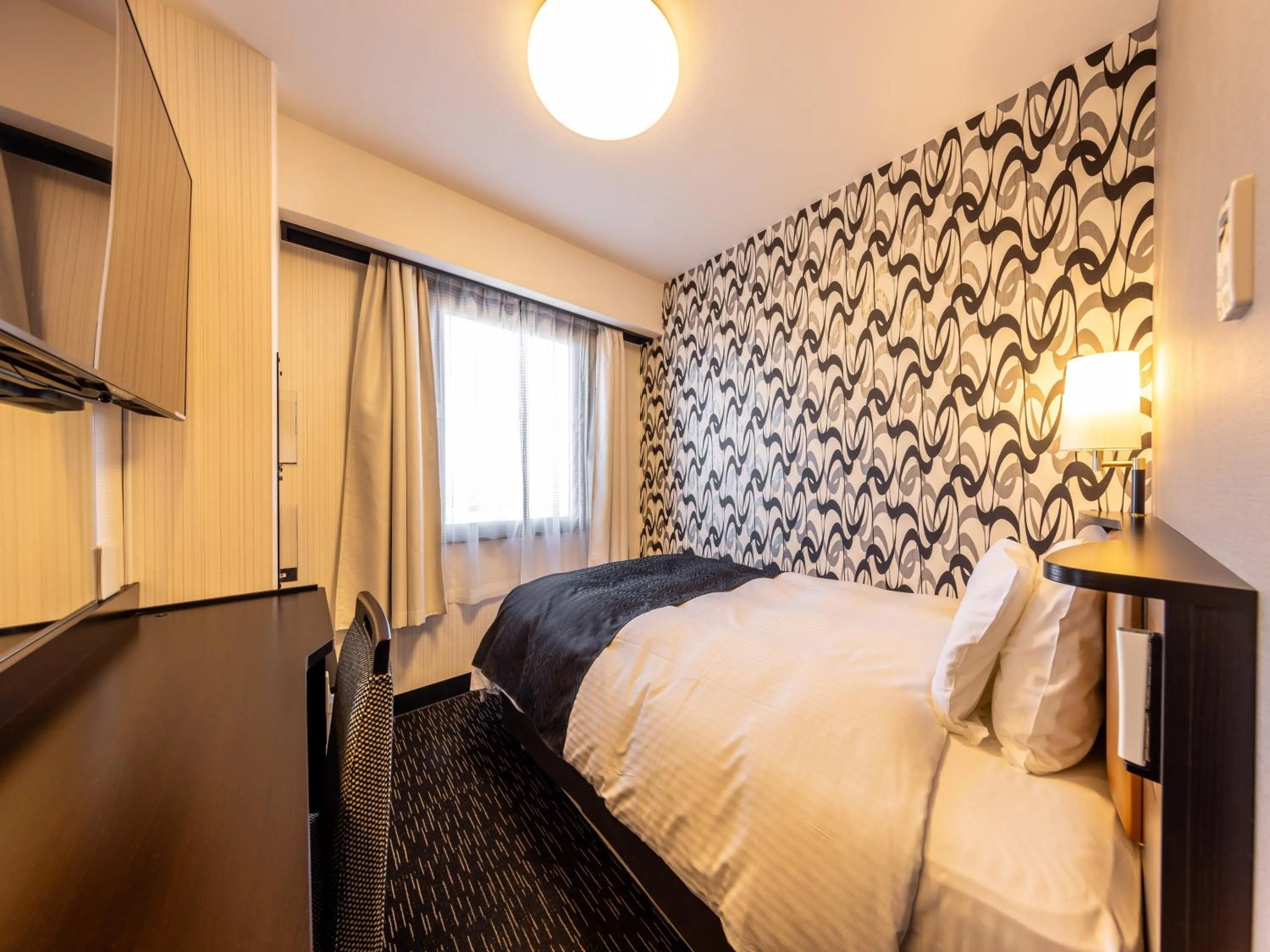 Bed in APA Hotel Uozu Ekimae