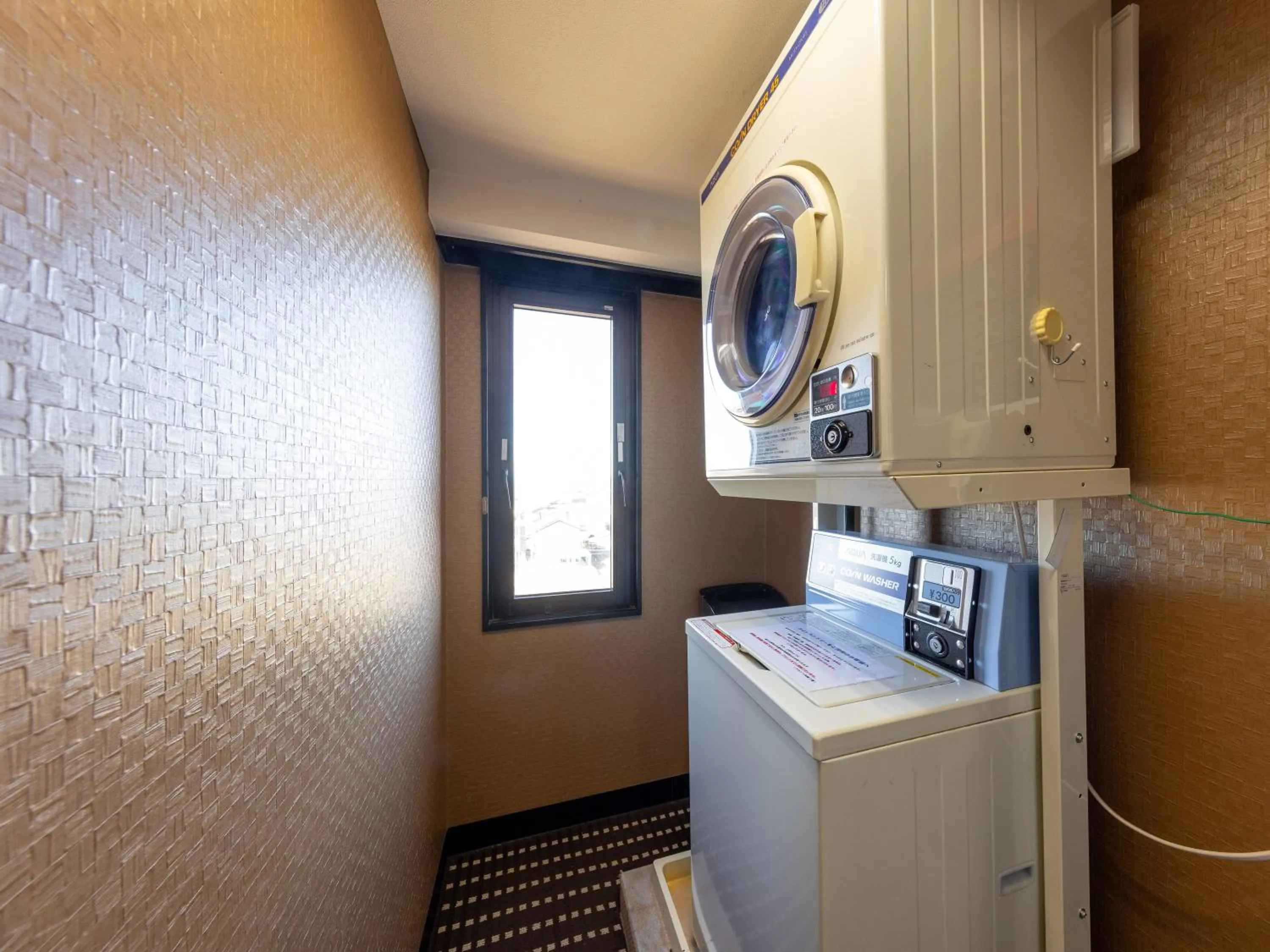 washing machine in APA Hotel Uozu Ekimae