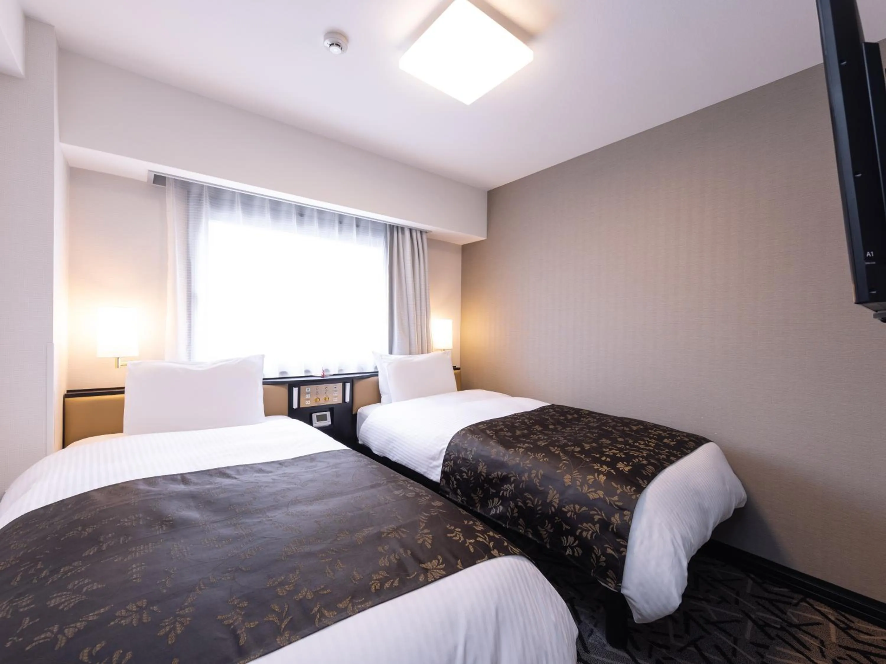 Photo of the whole room, Bed in APA Hotel Saga Ekimae Chuo