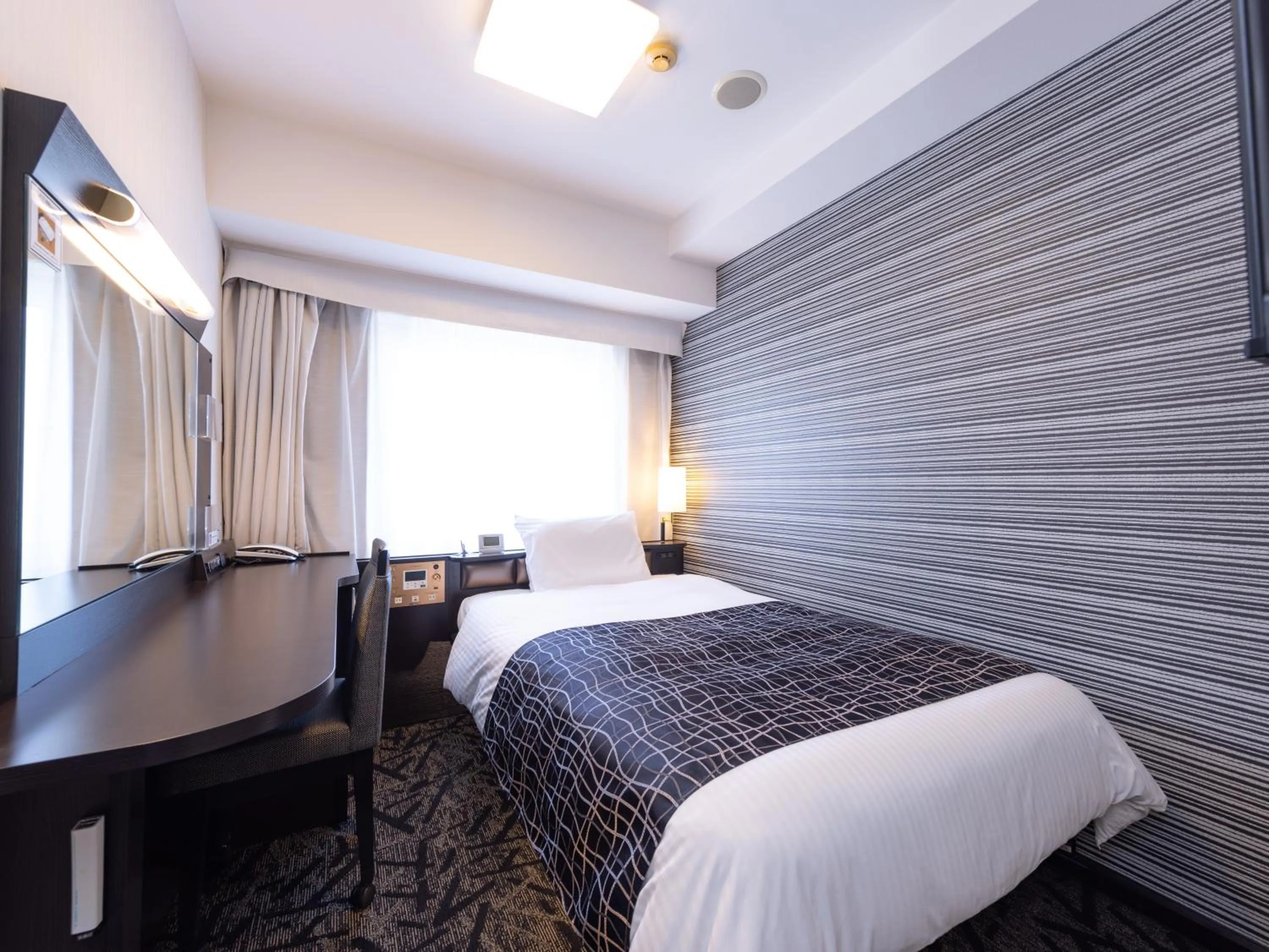 Photo of the whole room, Bed in APA Hotel Sendai Eki Itsutsubashi