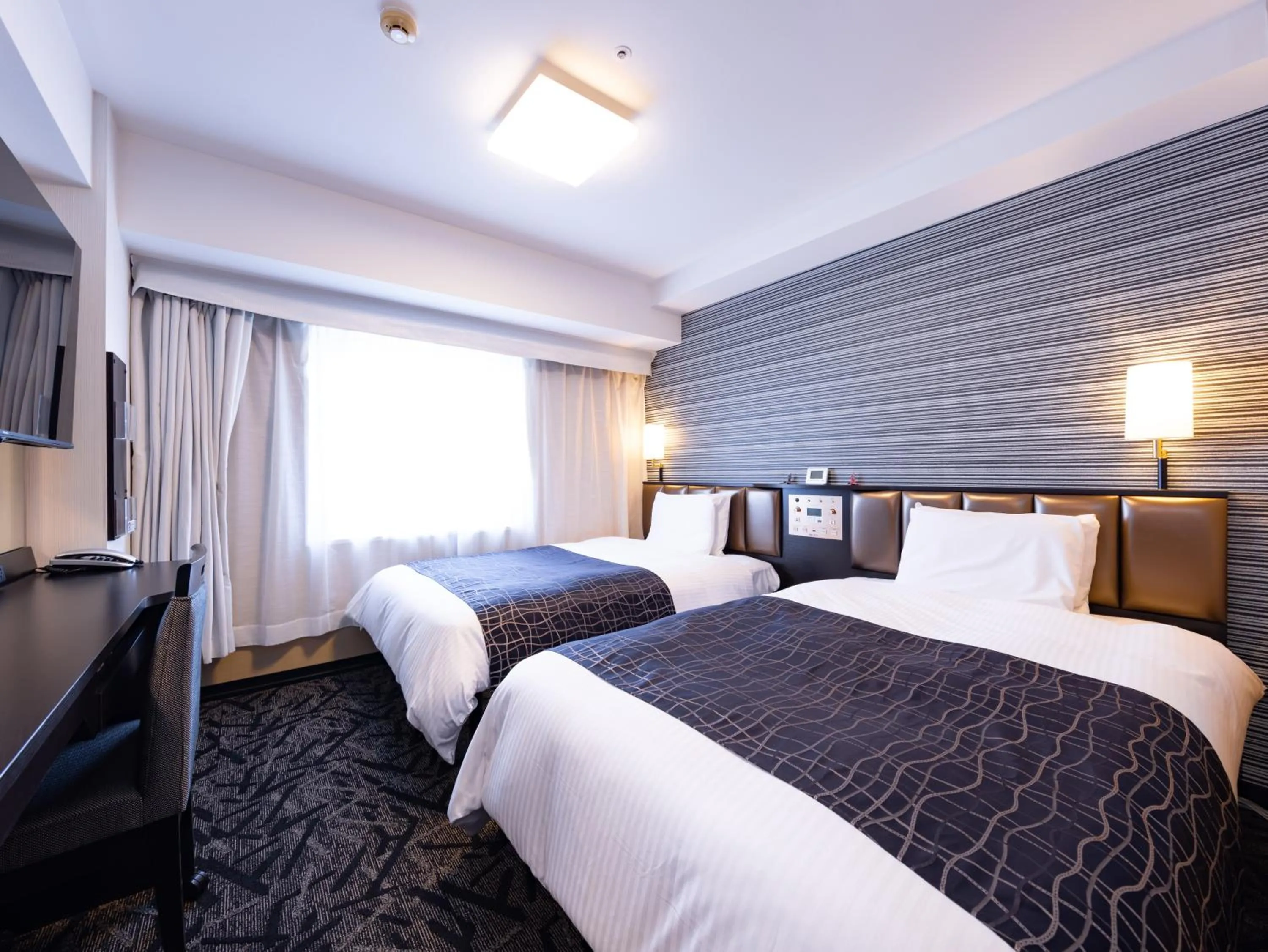 Photo of the whole room, Bed in APA Hotel Sendai Eki Itsutsubashi