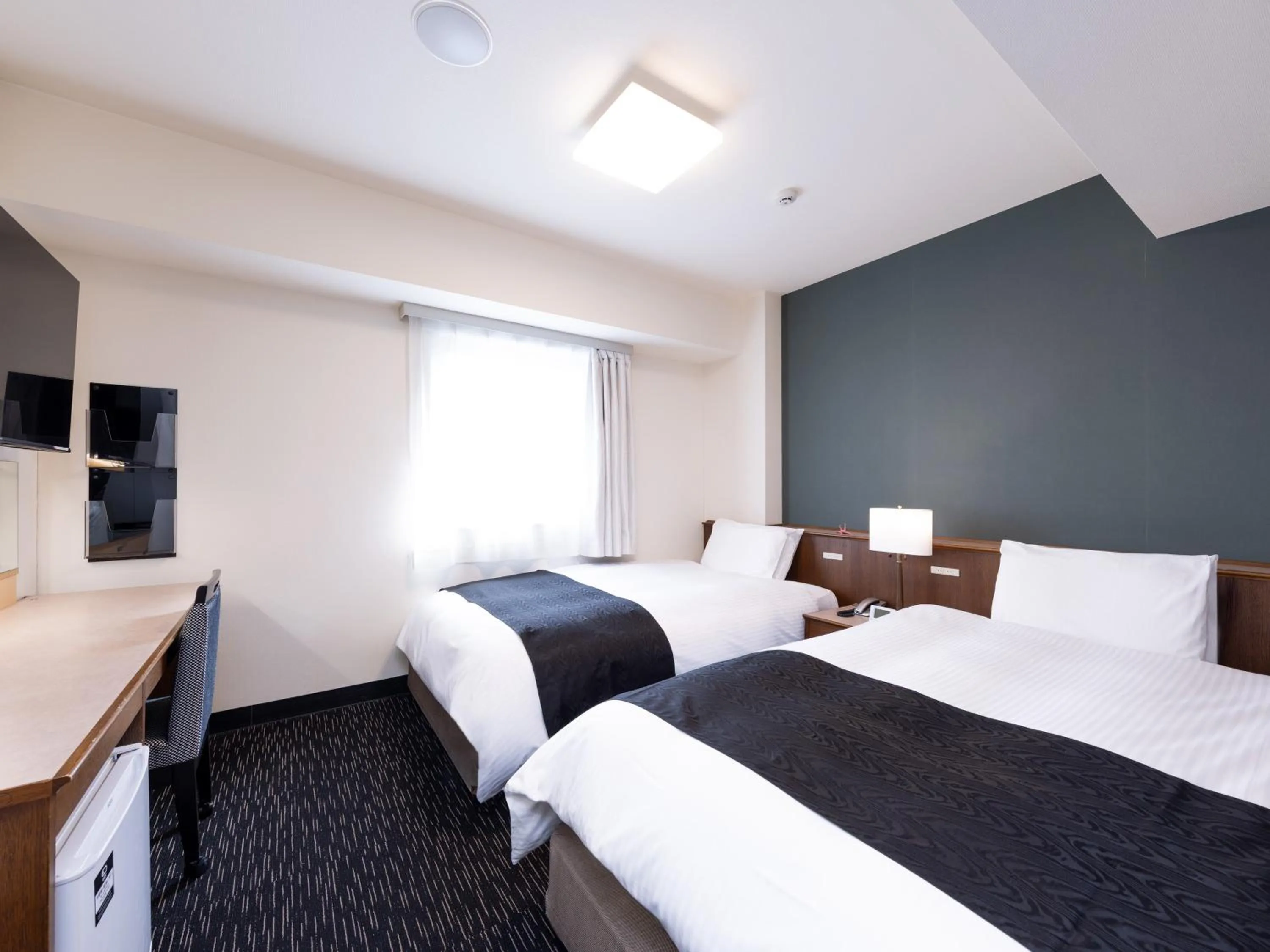 Photo of the whole room, Bed in APA Hotel Sendai Kotodai Koen