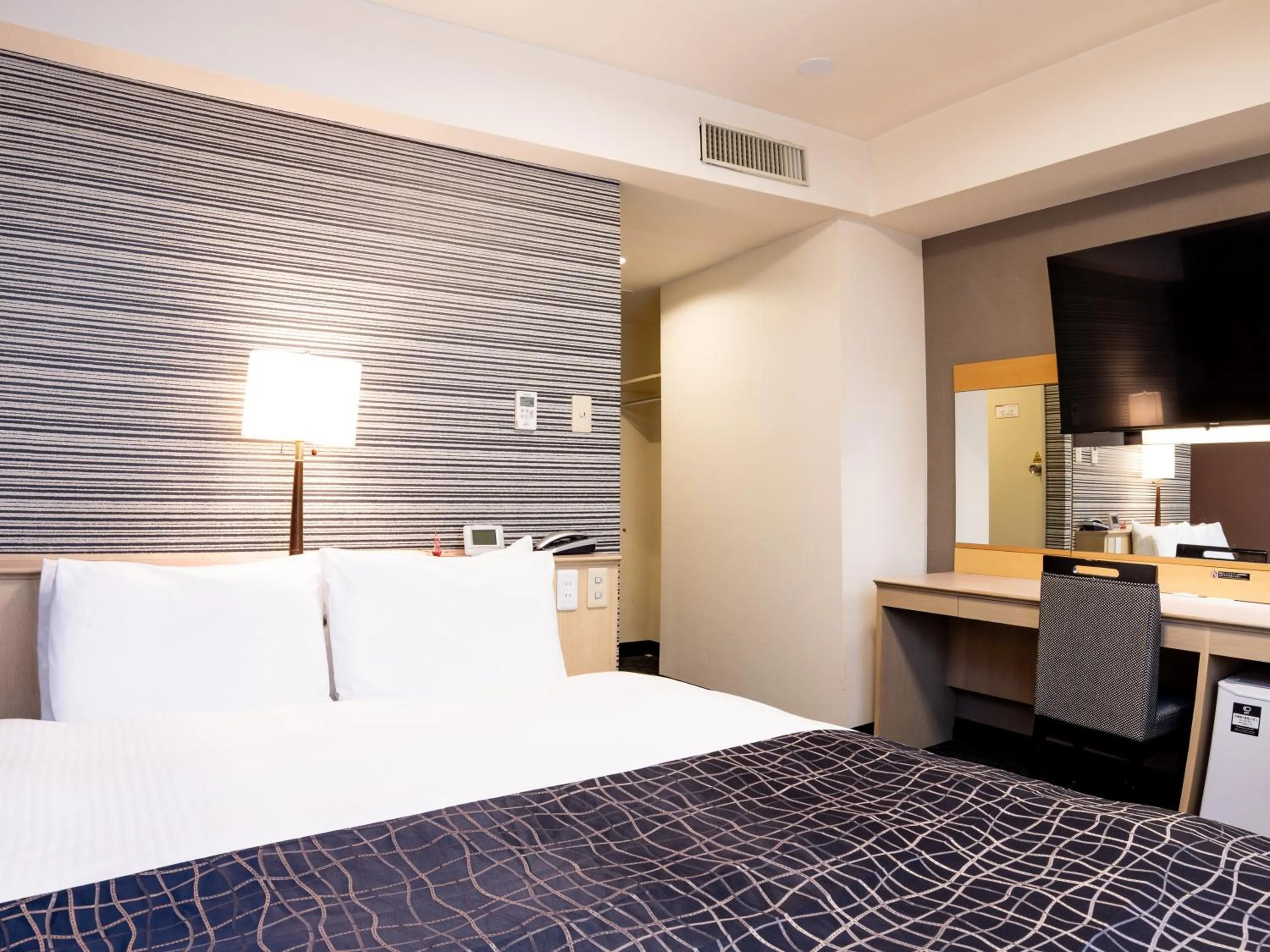 Photo of the whole room, Bed in APA Hotel Sendai Kotodai Koen