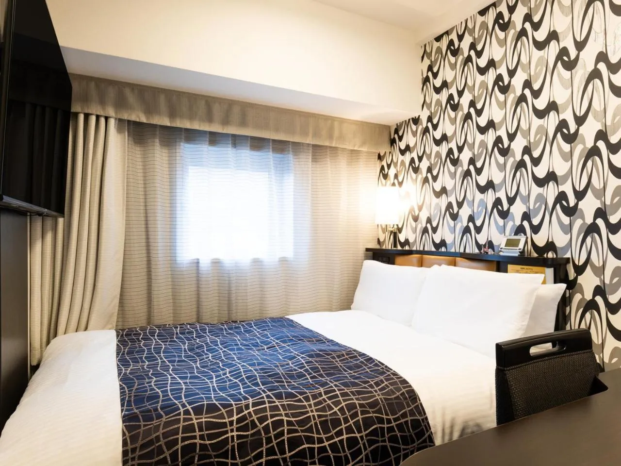 Bed in APA Hotel Kanazawa Ekimae