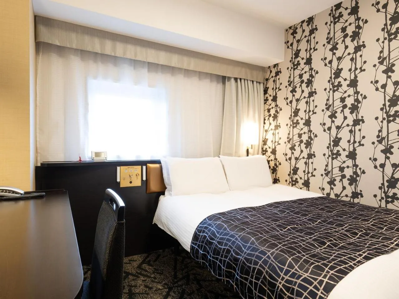 Bed in APA Hotel Kanazawa Ekimae