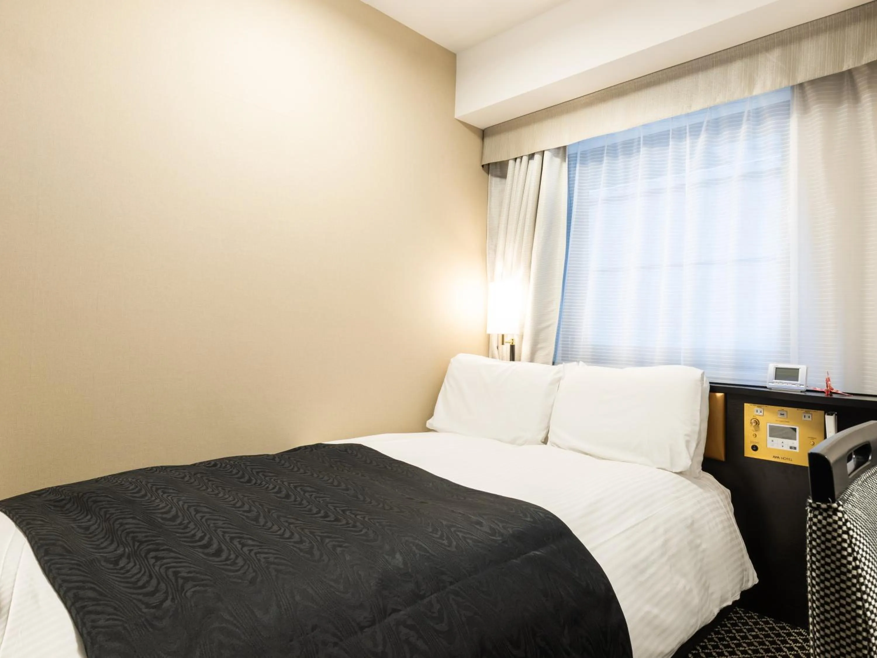 Photo of the whole room, Bed in APA Hotel Kanazawa Chuo
