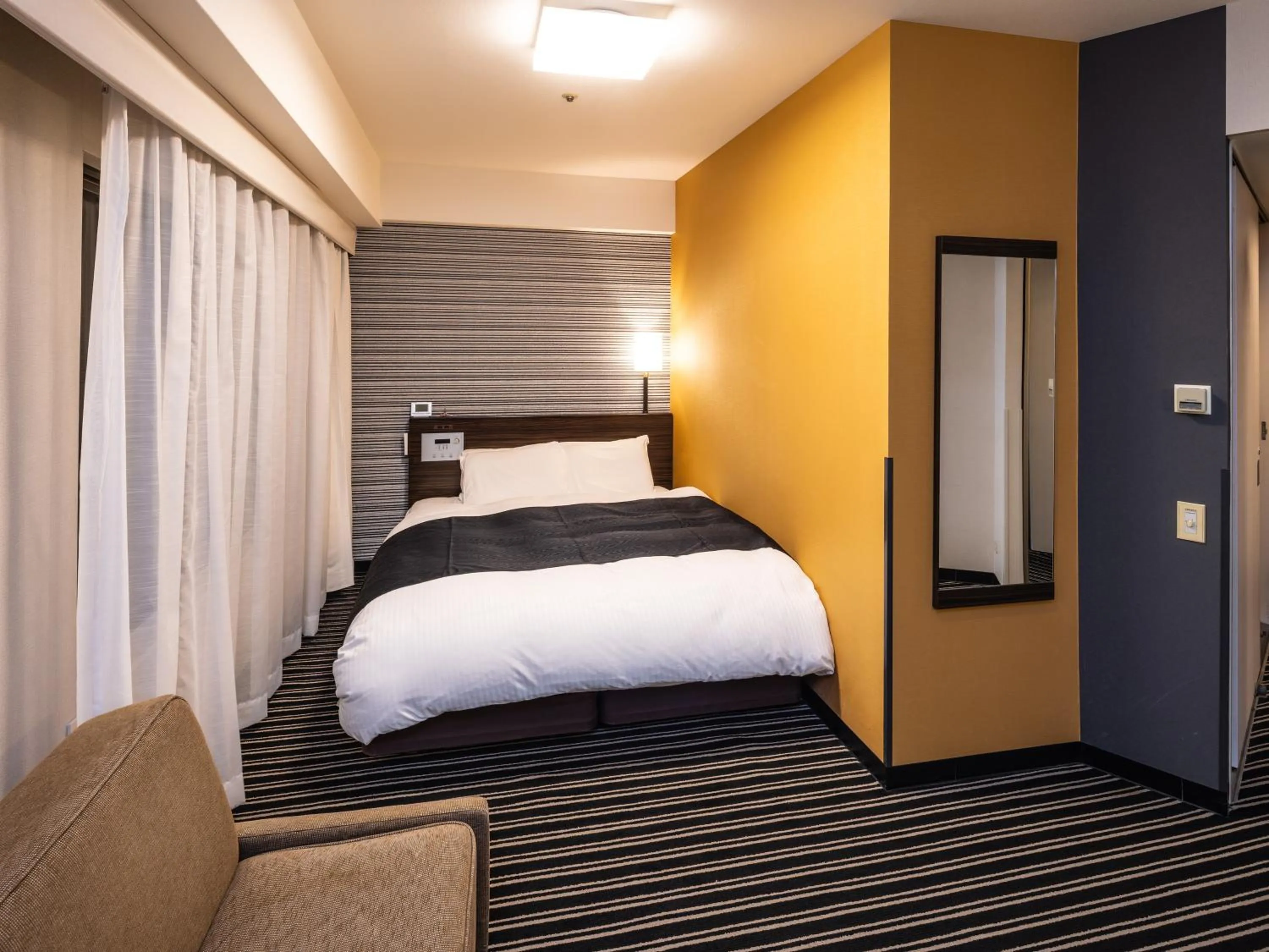 Photo of the whole room, Bed in APA Hotel Fukuoka Watanabedori Ekimae EXCELLENT