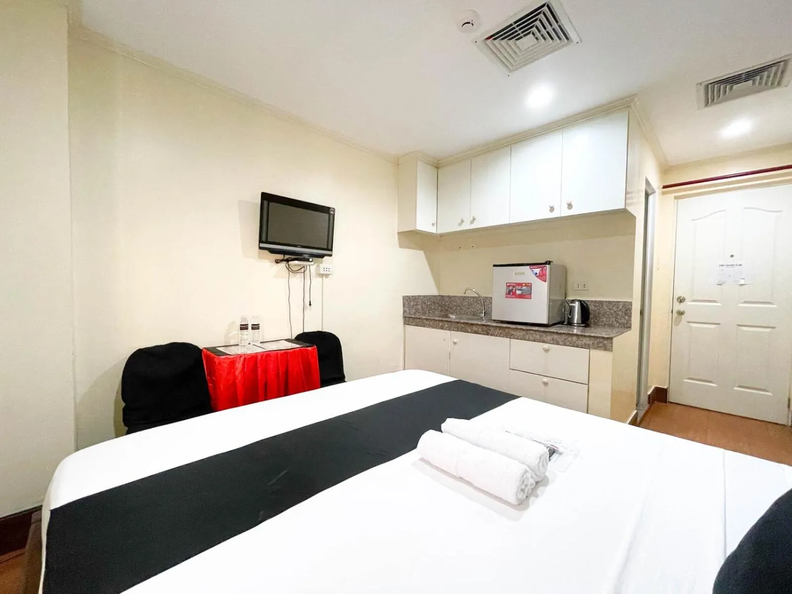 Bed in Chanel Paris Hotel powered by Cocotel