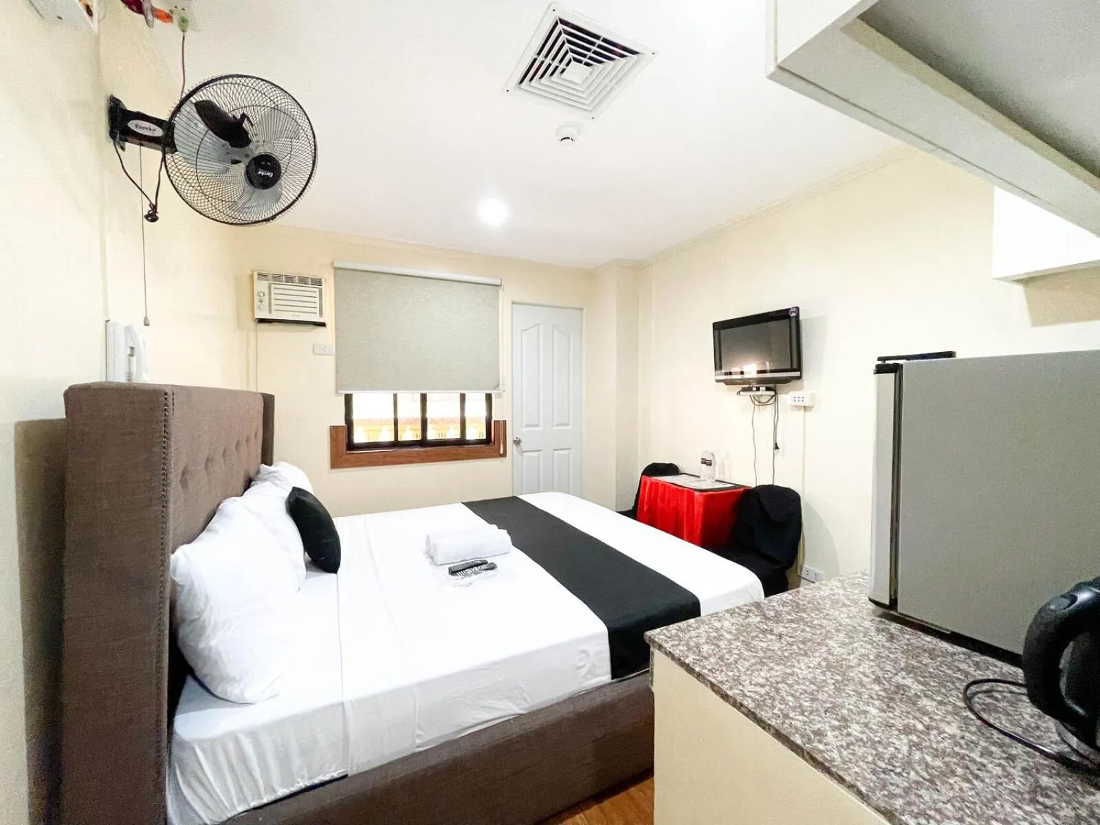 Bed in Chanel Paris Hotel powered by Cocotel