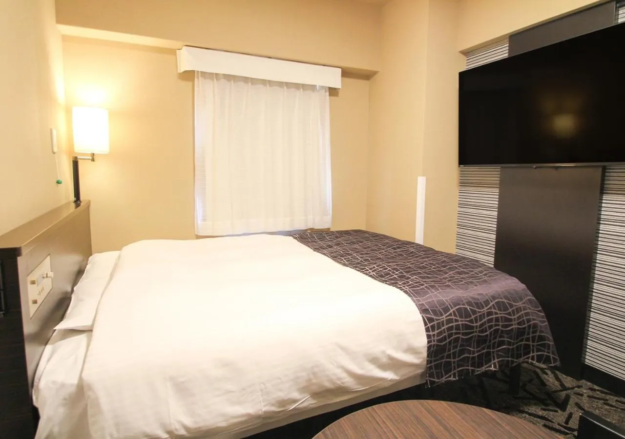 Photo of the whole room, Bed in APA Hotel Hakata Ekimae 4 chome