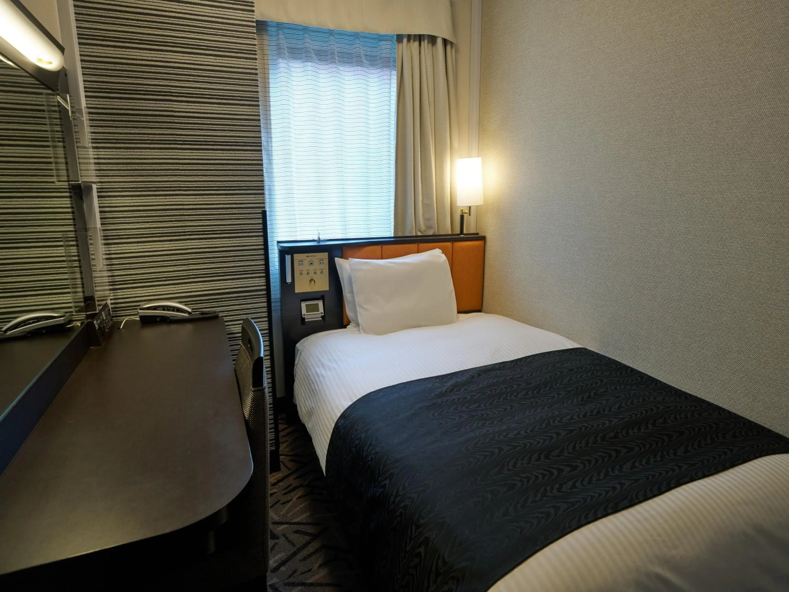 Photo of the whole room, Bed in APA Hotel Kurashiki Ekimae