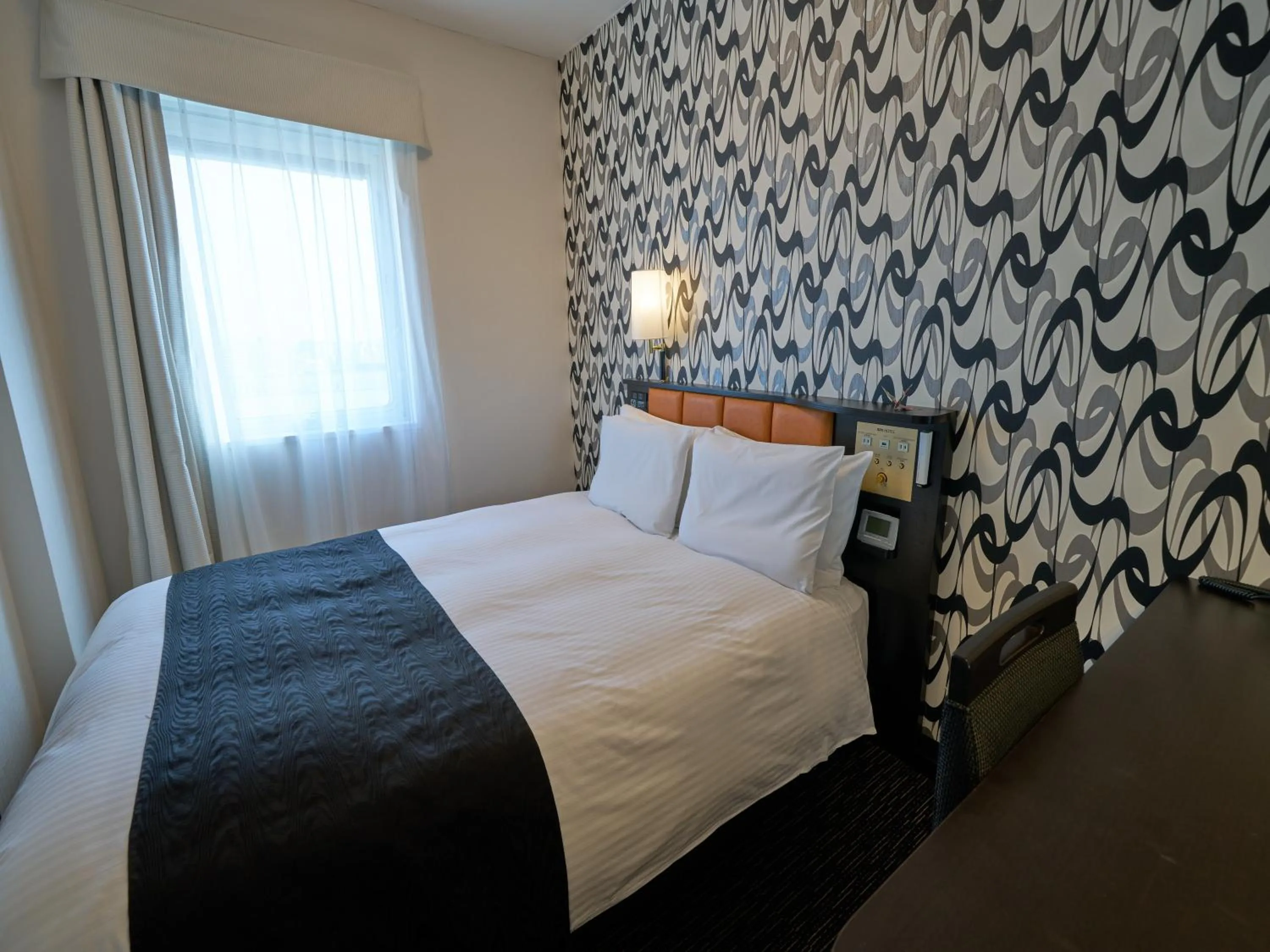 Photo of the whole room, Bed in APA Hotel Kurashiki Ekimae