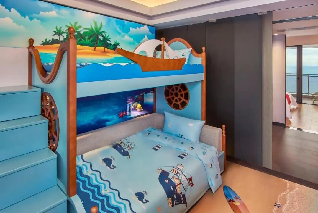 Bed in Dusit Thani Shuangyue Bay Resort Huizhou