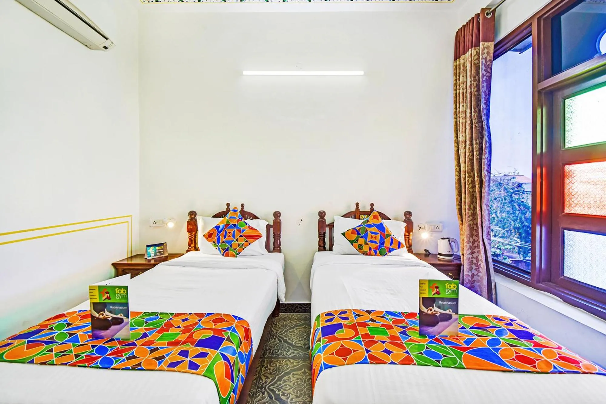 Bed in FabHotel Shree Villas