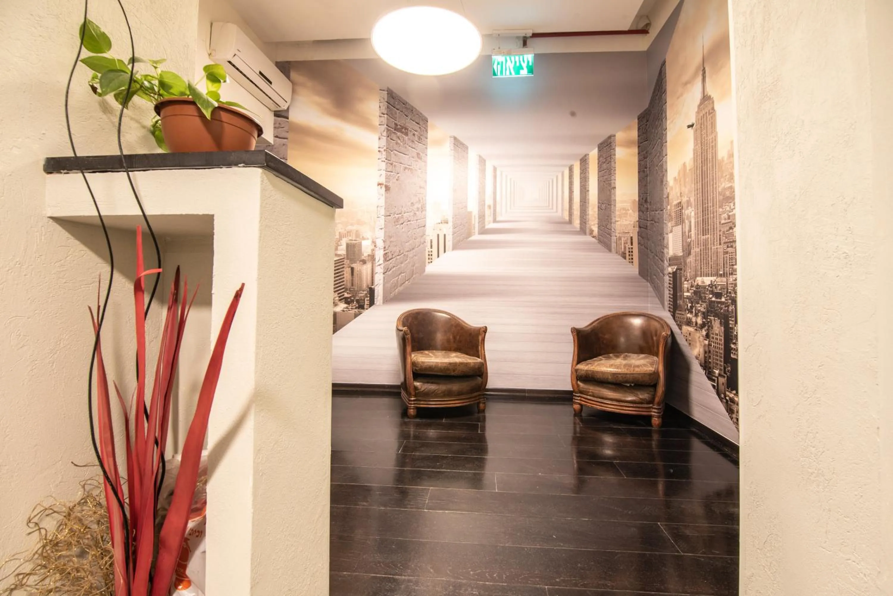 Communal lounge/ TV room in 27Montefiore - Urban ApartHotel TLV