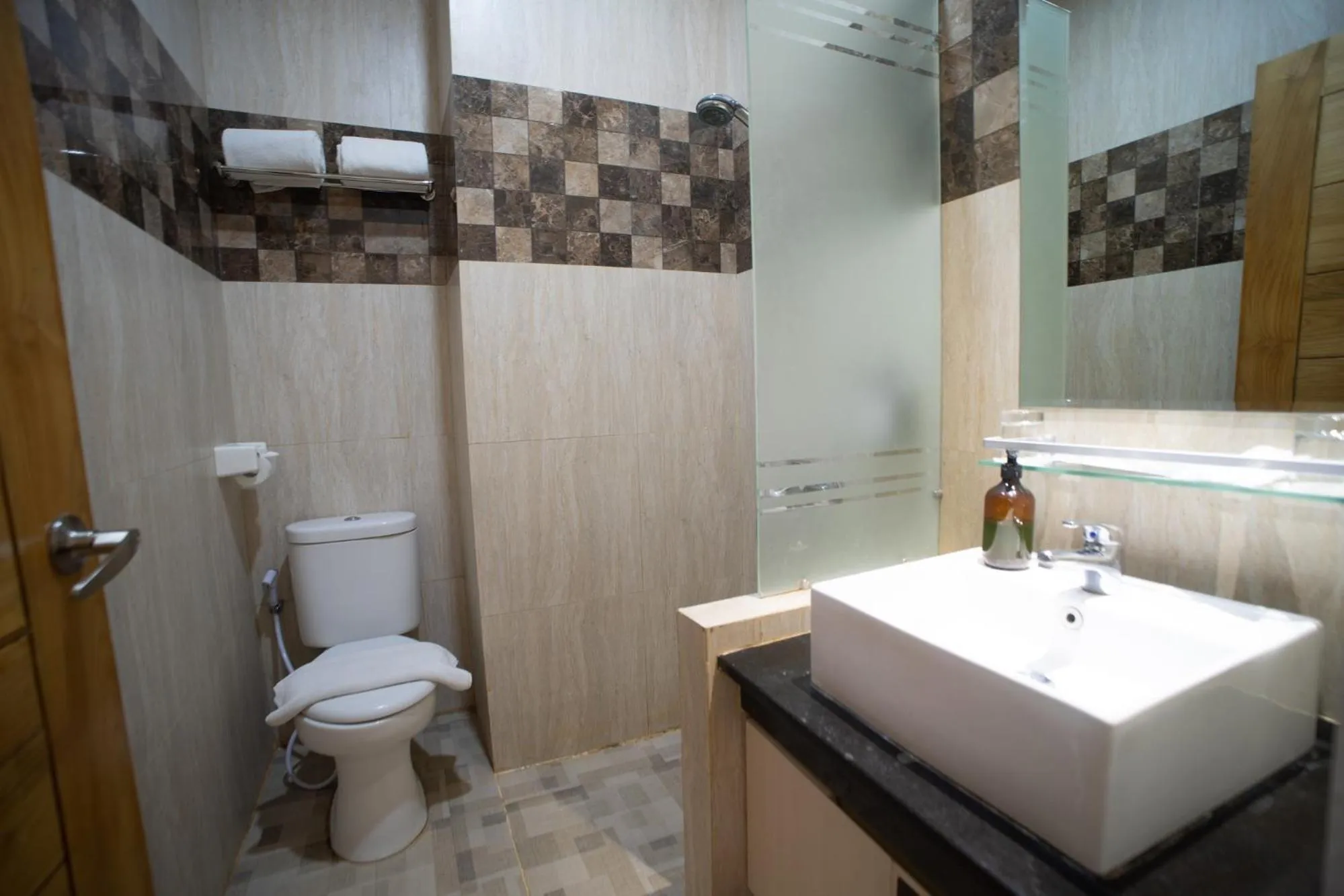 Bathroom in Luminor Hotel Banyuwangi By WH