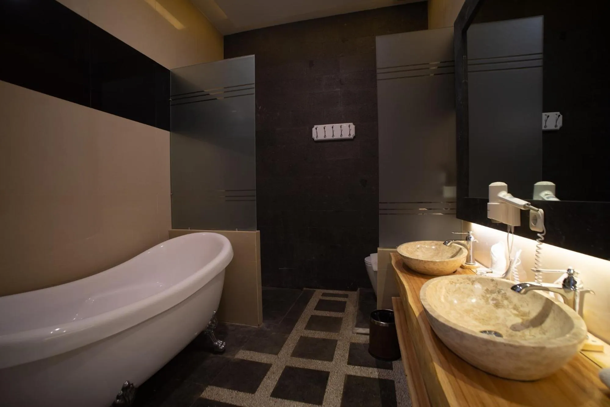 Bathroom in Luminor Hotel Banyuwangi By WH