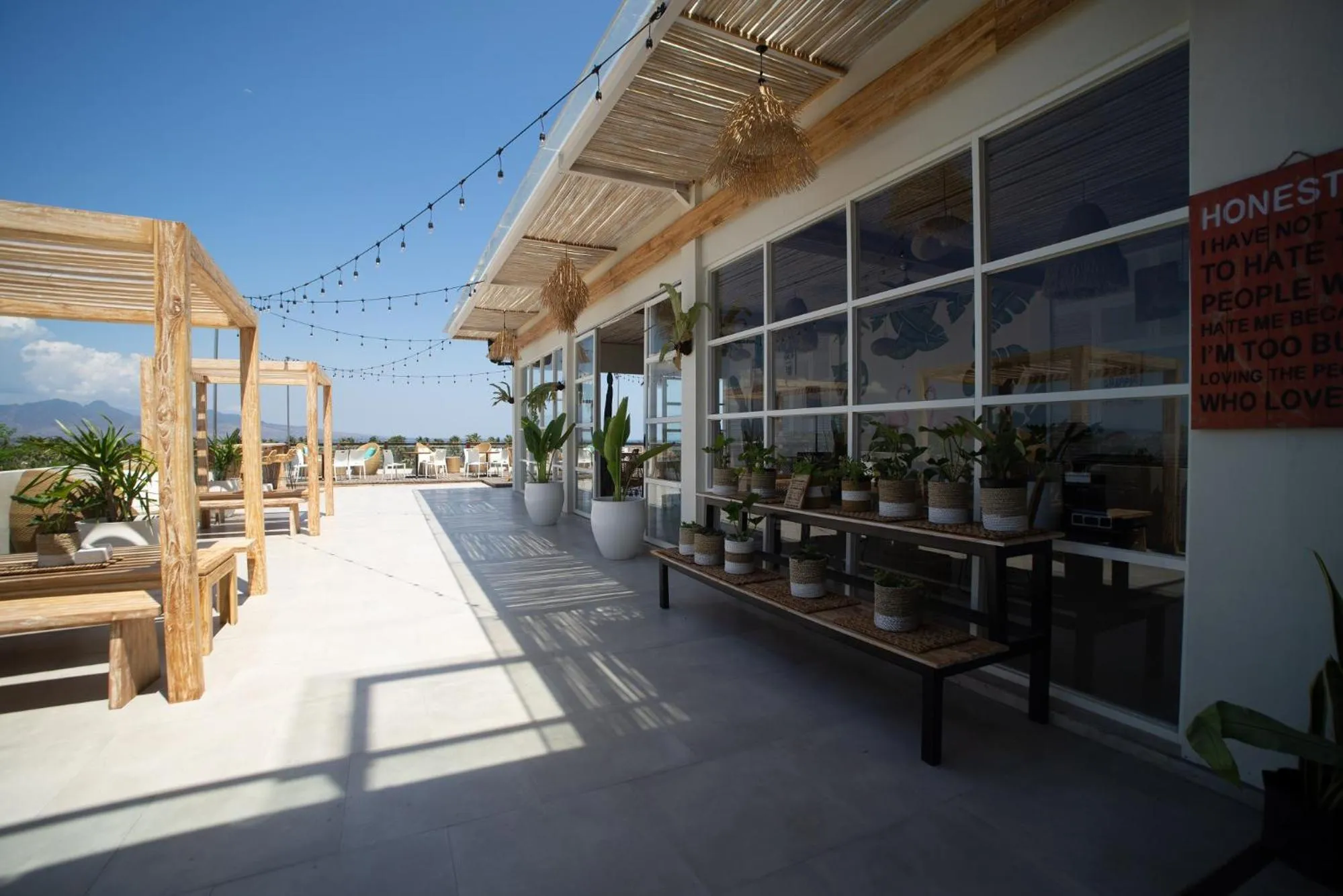 Lounge or bar in Luminor Hotel Banyuwangi By WH