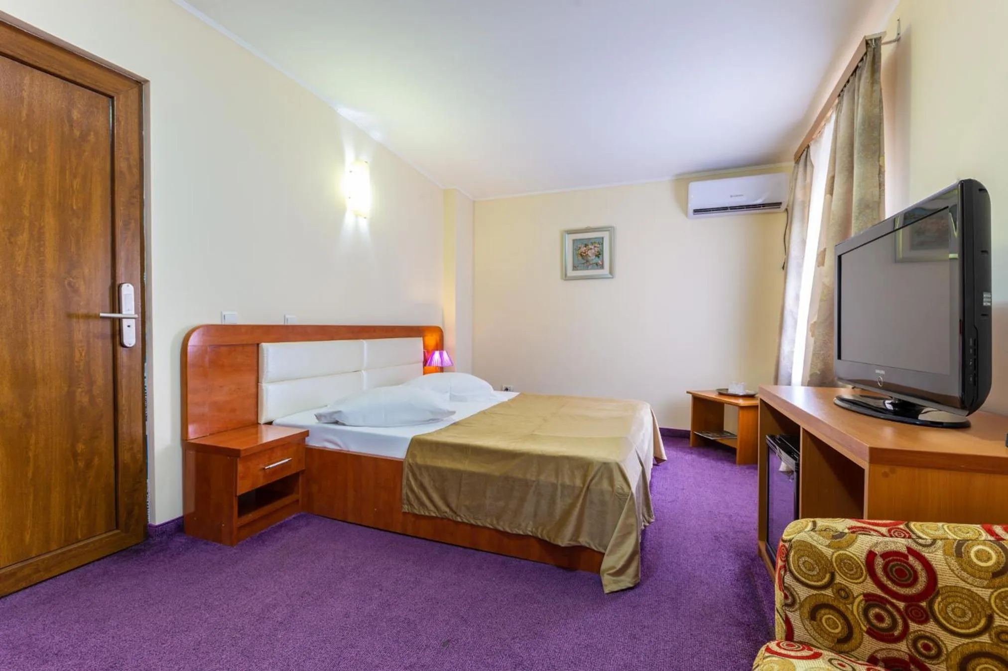 Bed in Hotel Amphitryon