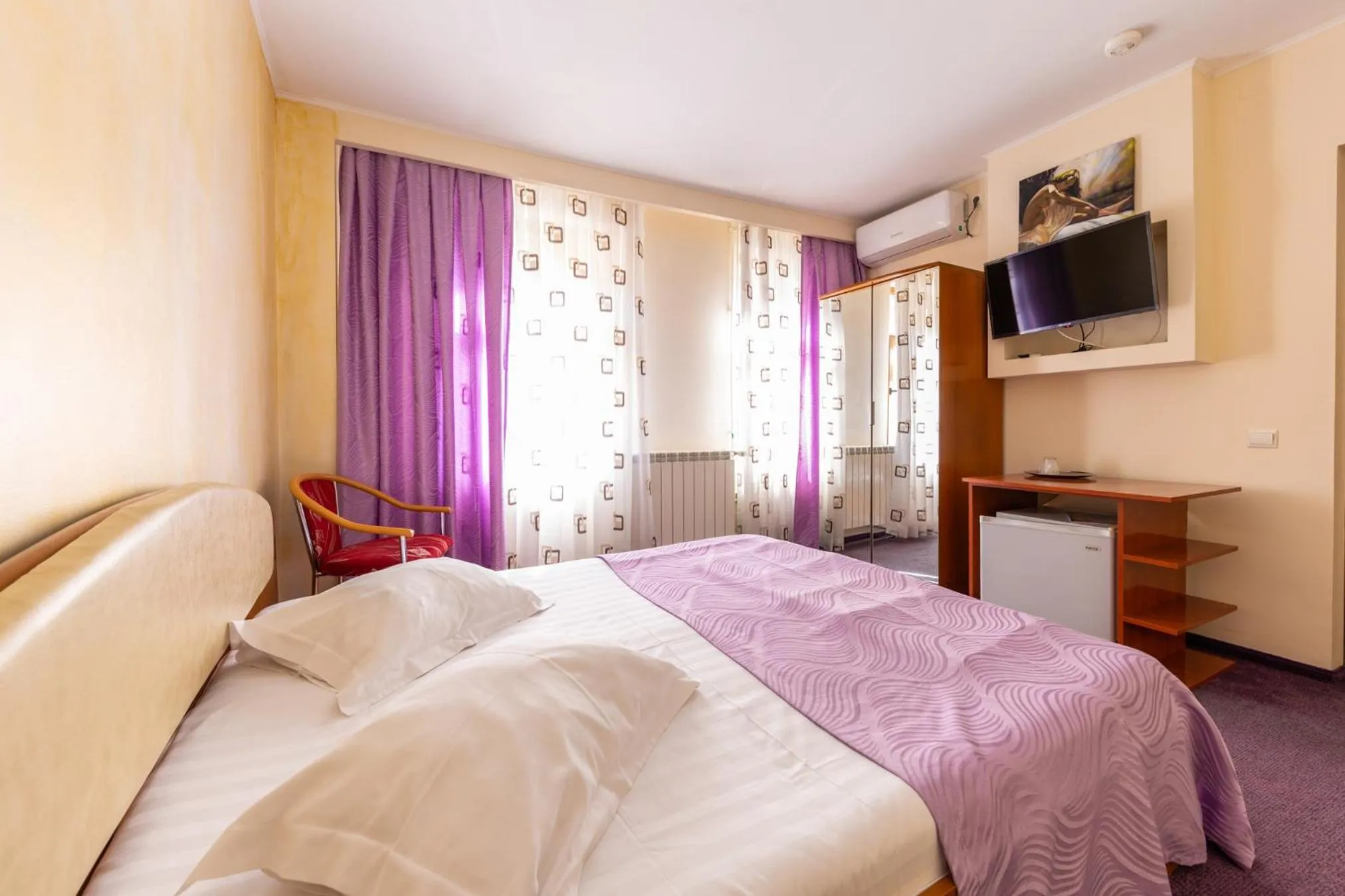 Bed in Hotel Amphitryon