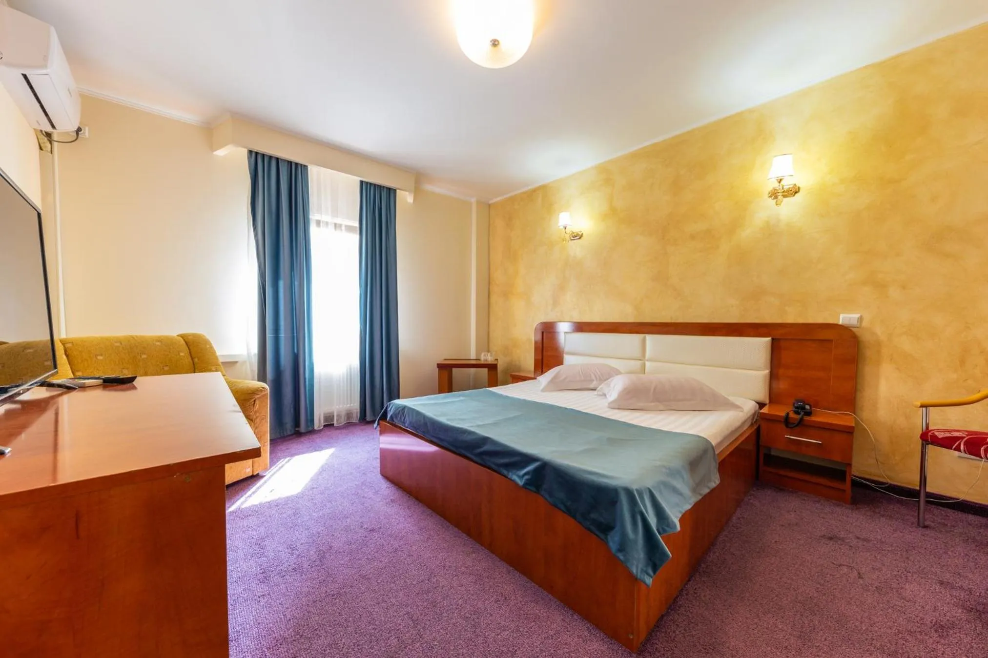 Bed in Hotel Amphitryon