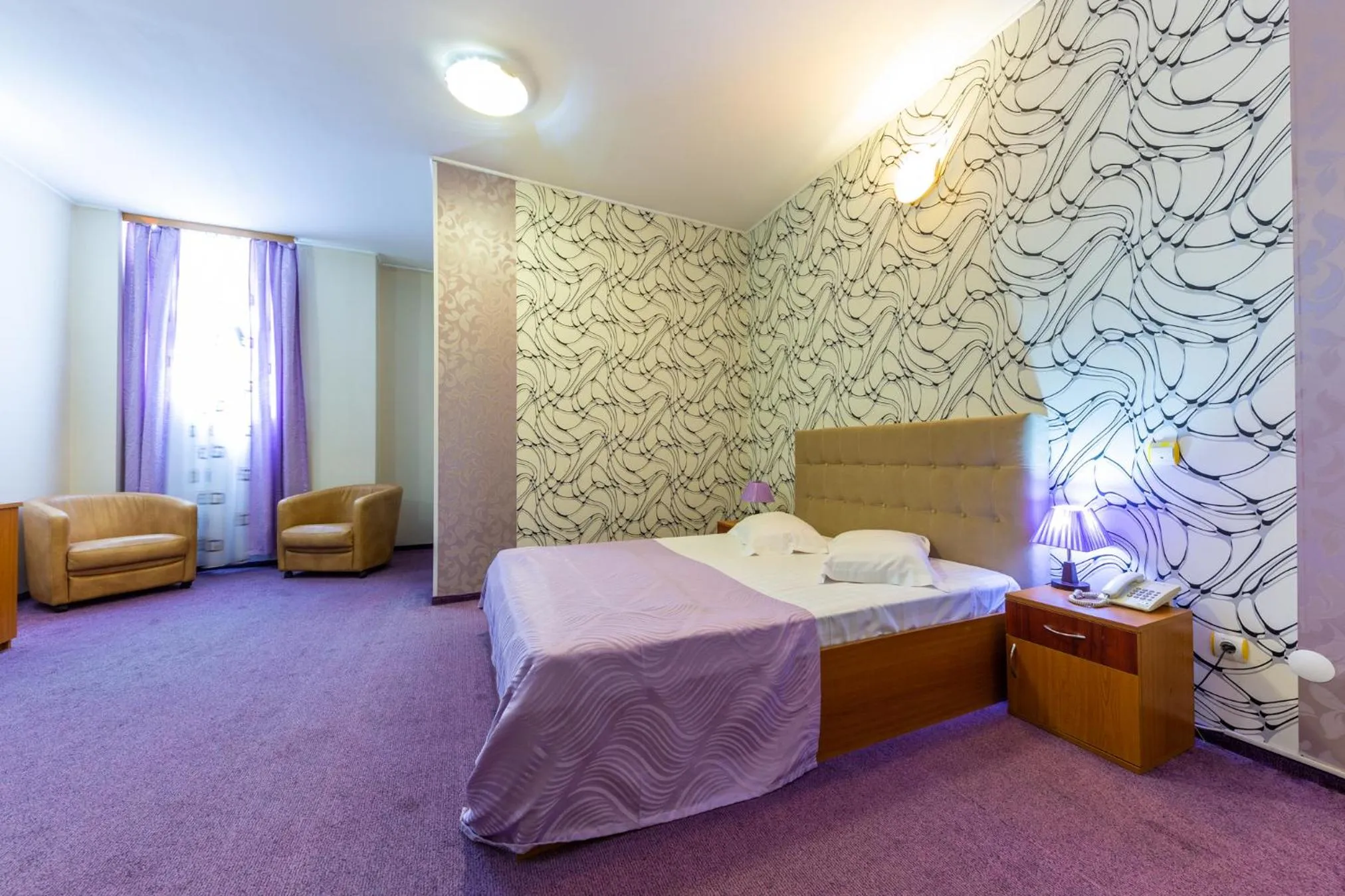 Bed in Hotel Amphitryon