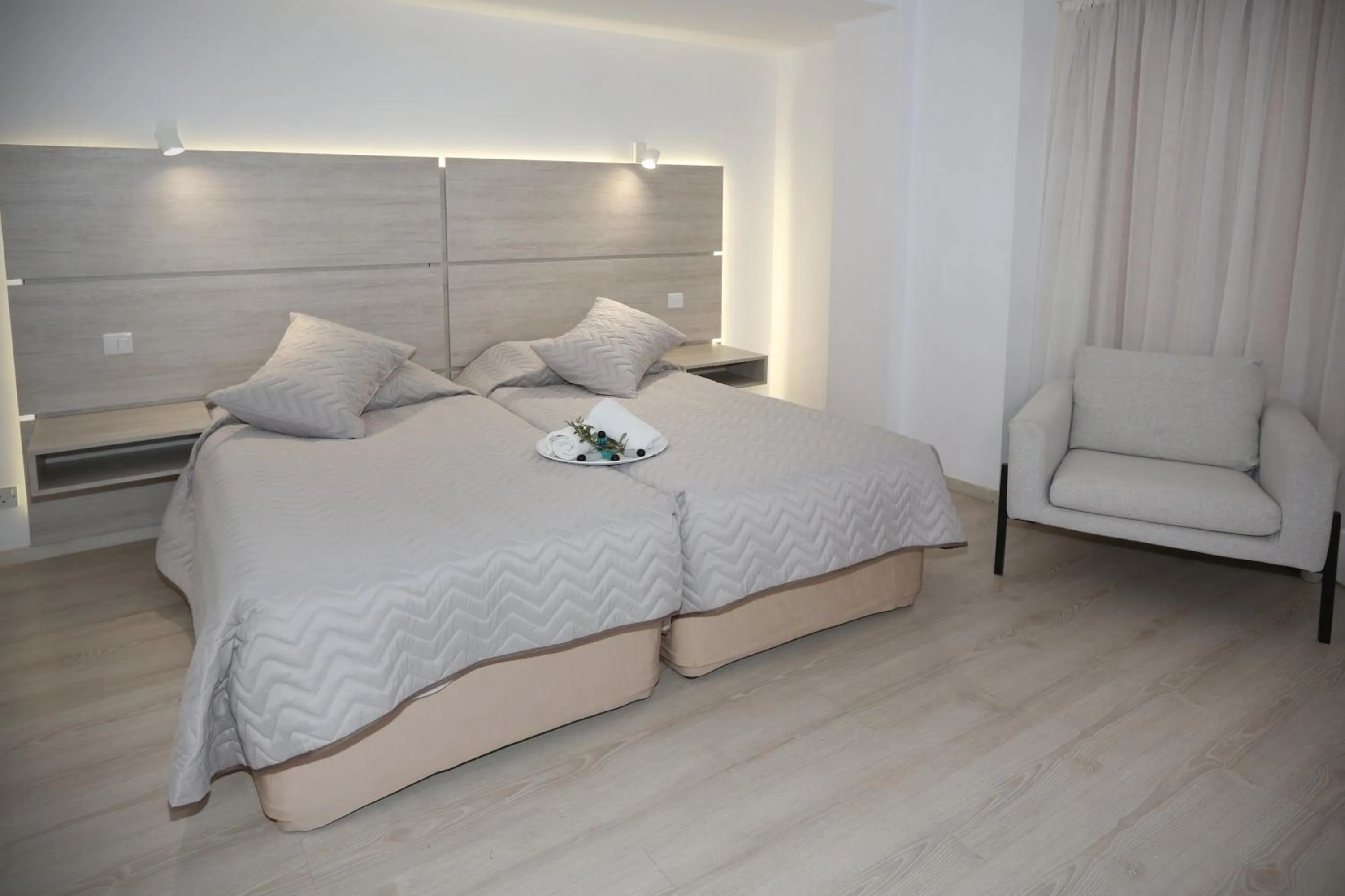 Bed in Pier Beach Hotel Apartments