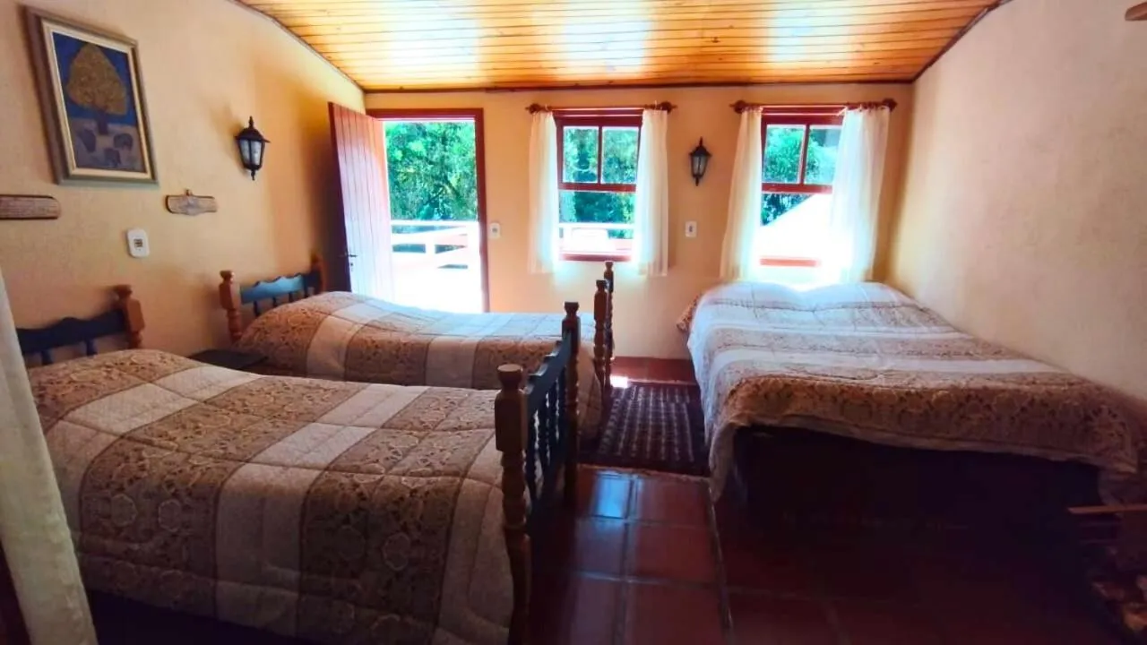 Bed in Pousada das Montanhas
