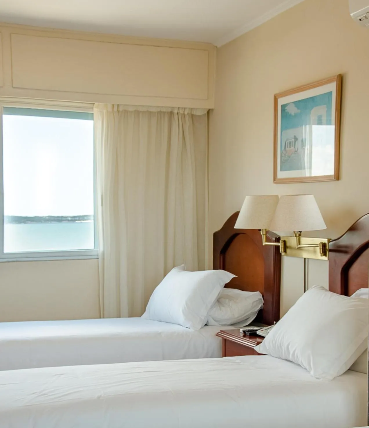 Bed in Hotel Sunset Beach