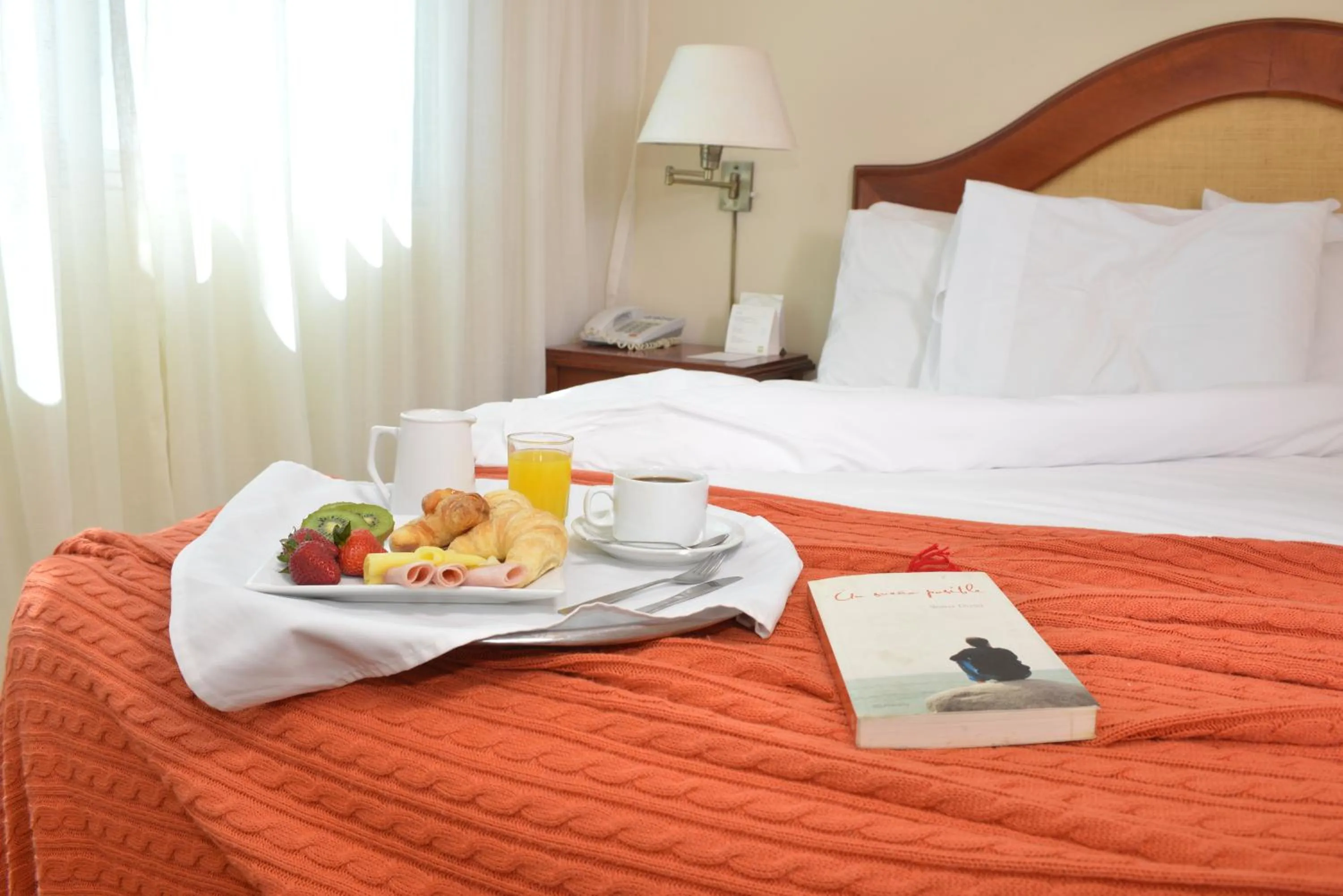 Bed in Hotel Sunset Beach