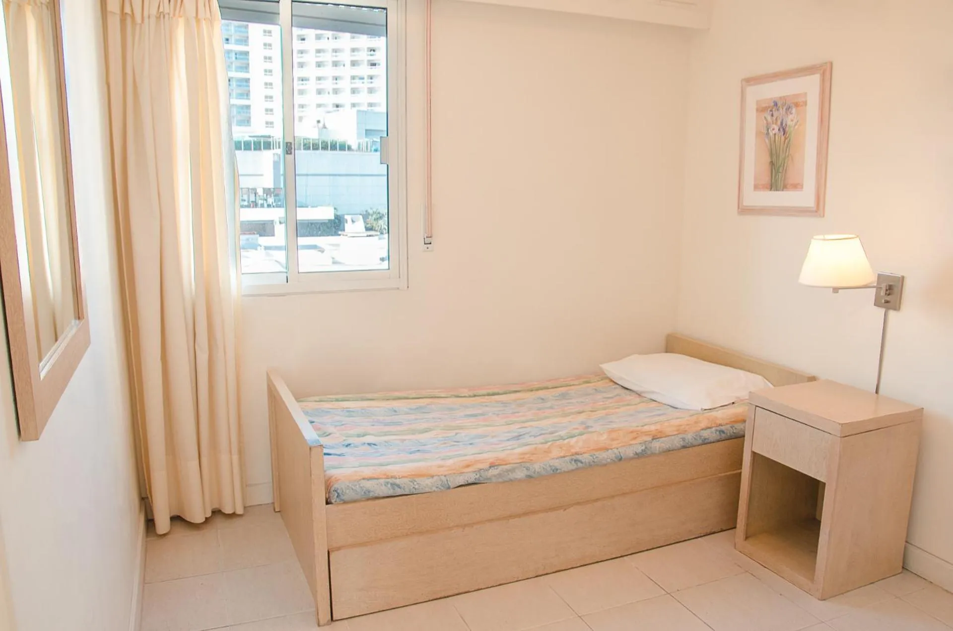 Bed in Hotel Sunset Beach