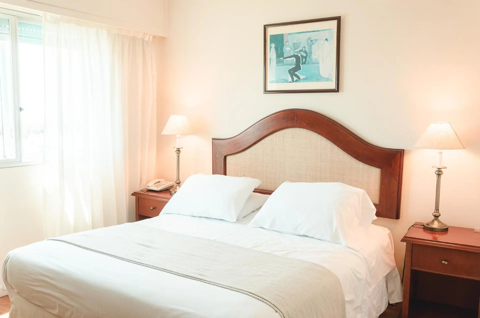 Bed in Hotel Sunset Beach