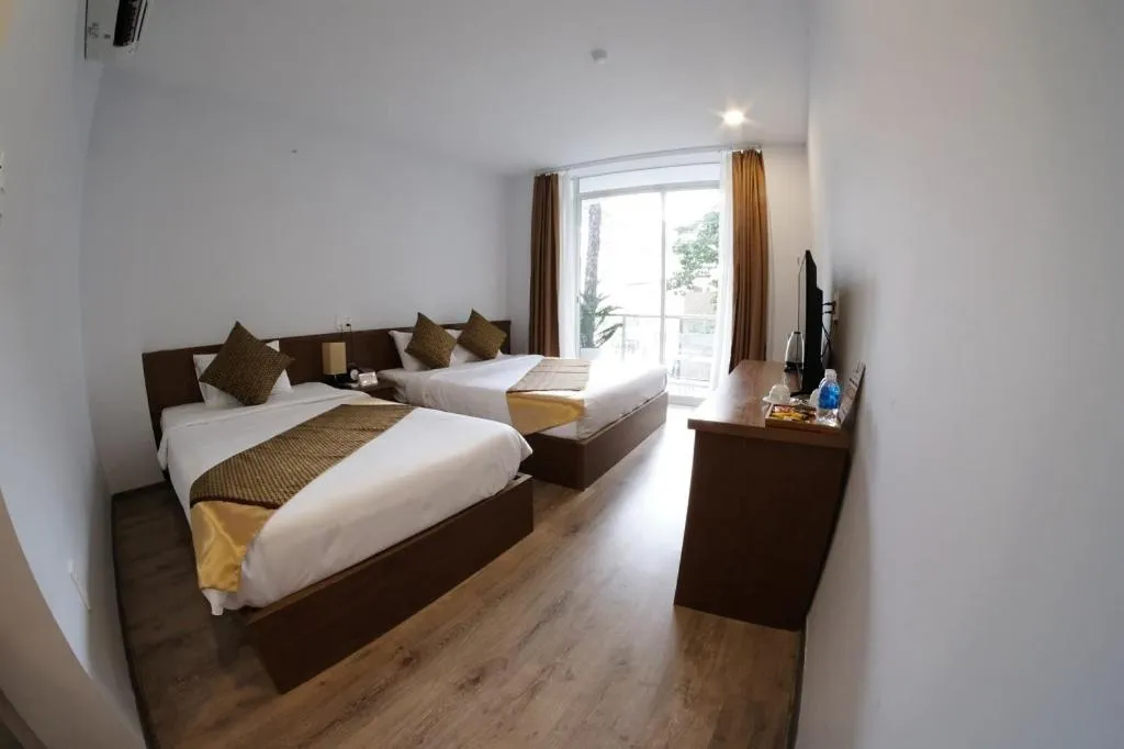 Bed in The Umi Hotel