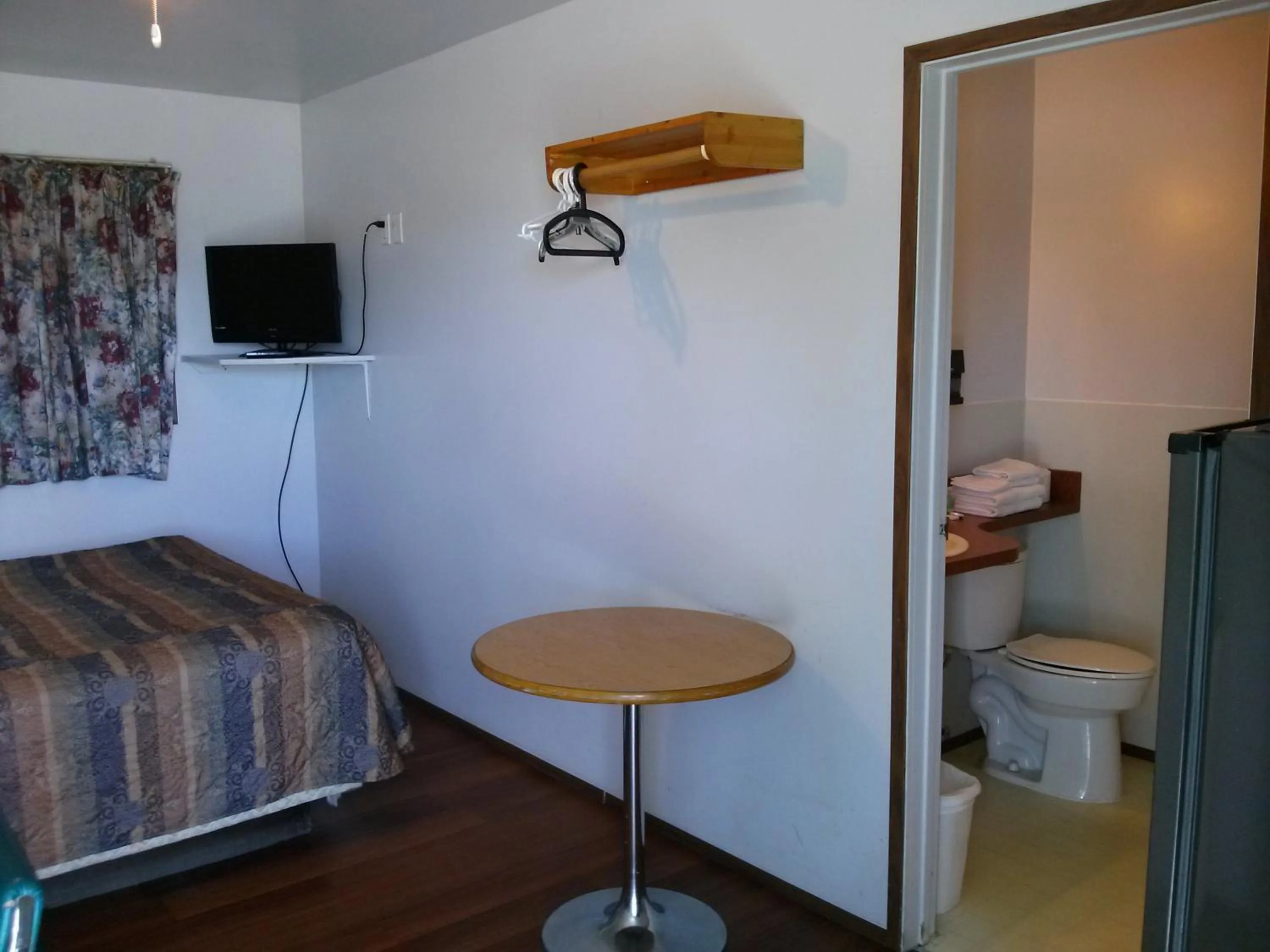 Bed in Moosomin Motel