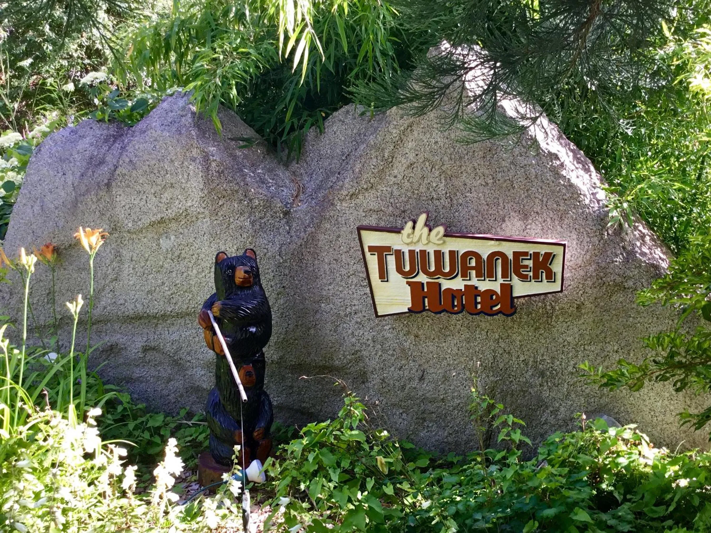 Property logo or sign in The Tuwanek Hotel and Spa