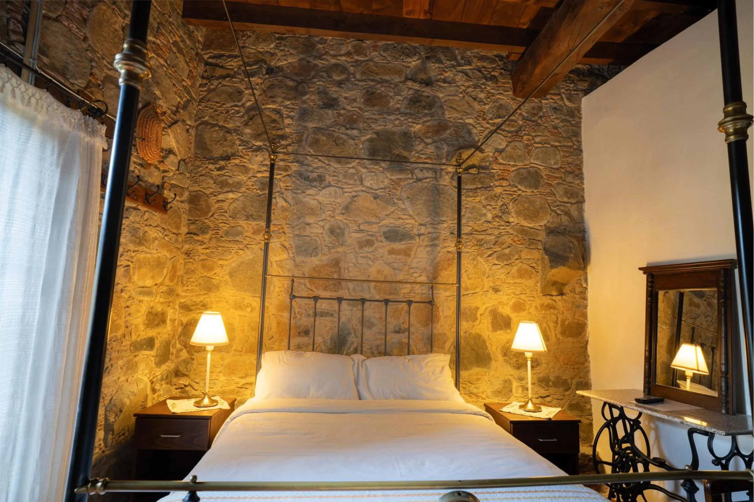 Bed in Ambelikos Traditional Agrohotel
