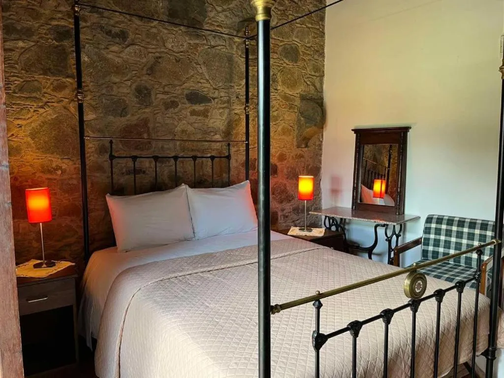 Bed in Ambelikos Traditional Agrohotel