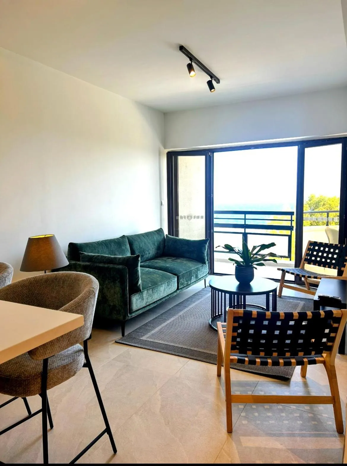 Living room in Pigeon Beach Hotel Apartments