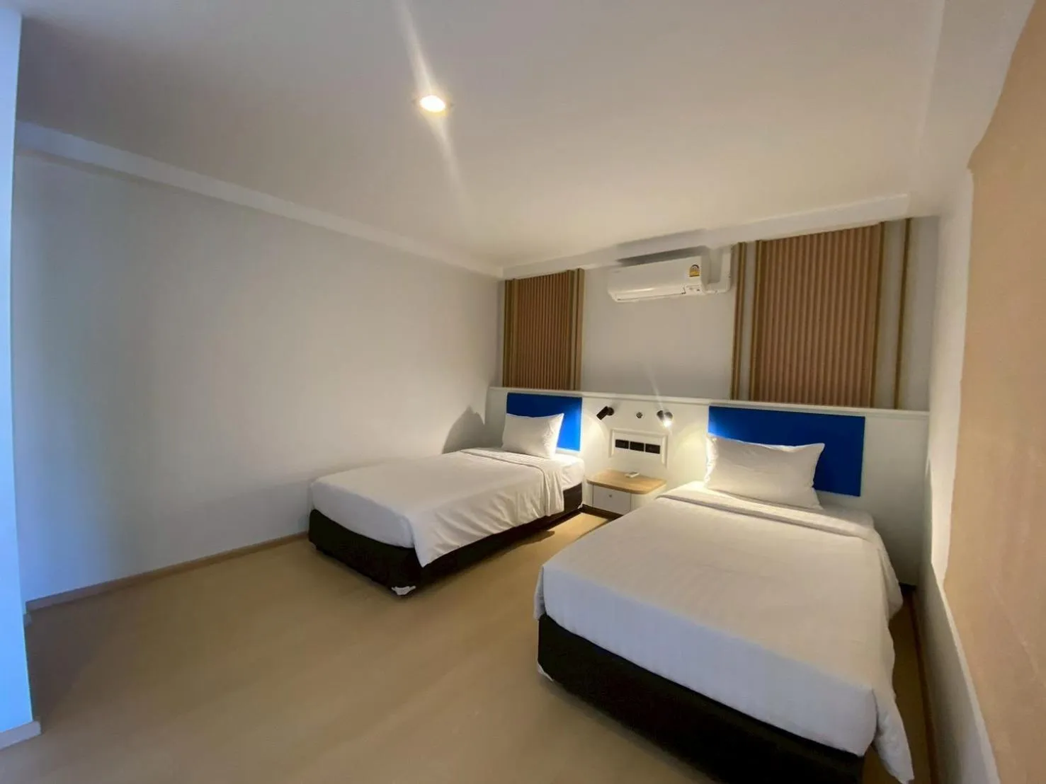 Bed in Armoni Patong Beach Hotel