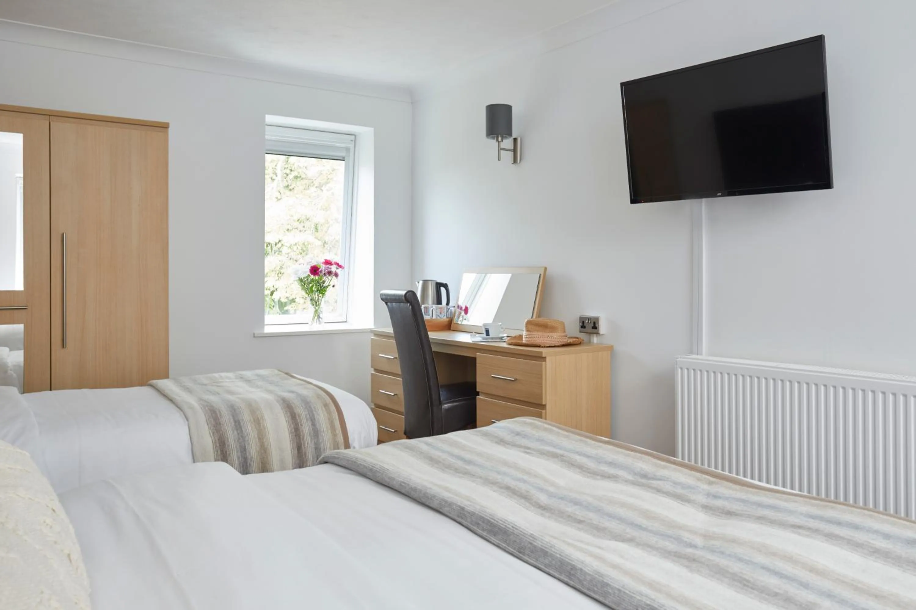 Bed in Luccombe Manor Country House Hotel