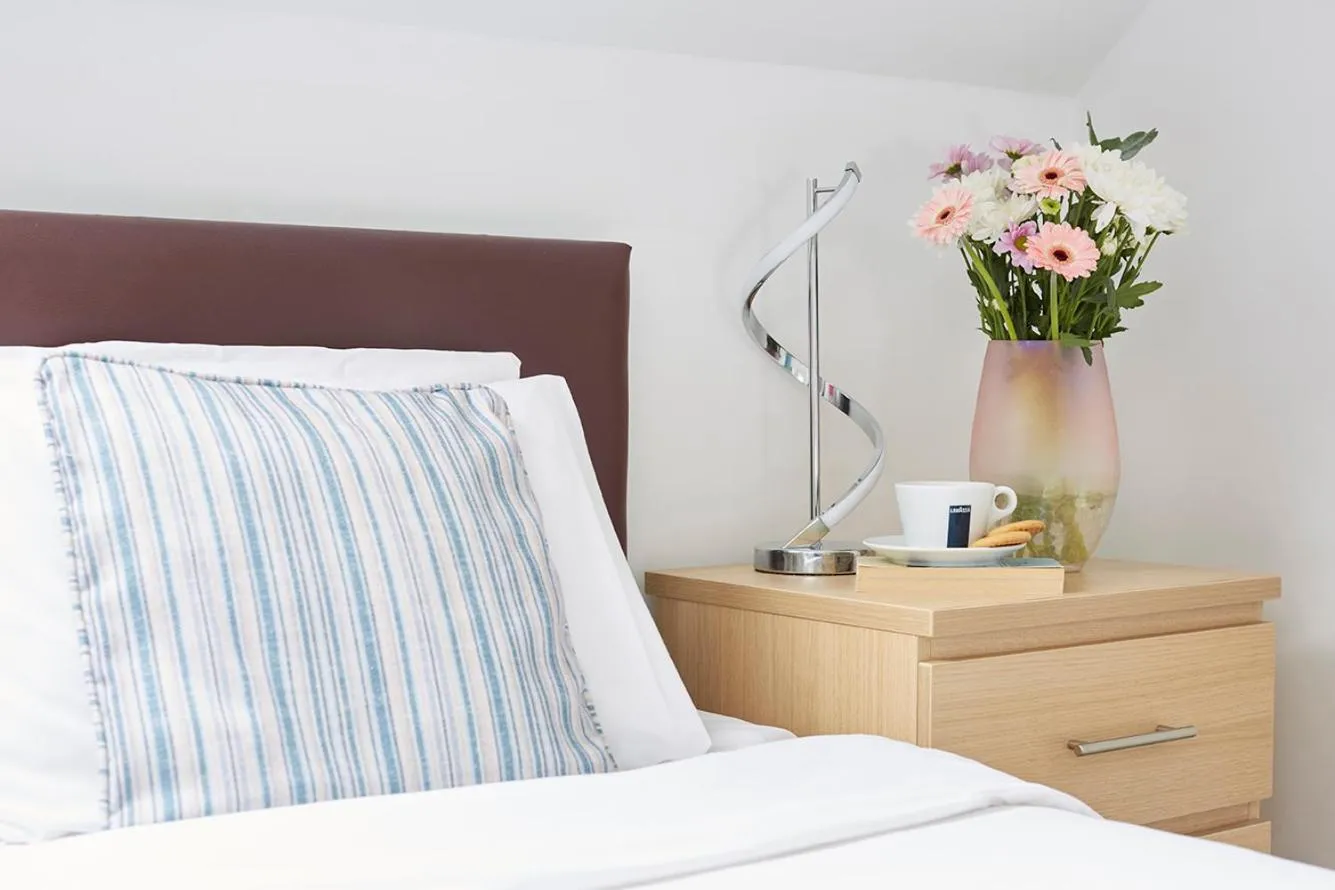 Bed in Luccombe Manor Country House Hotel