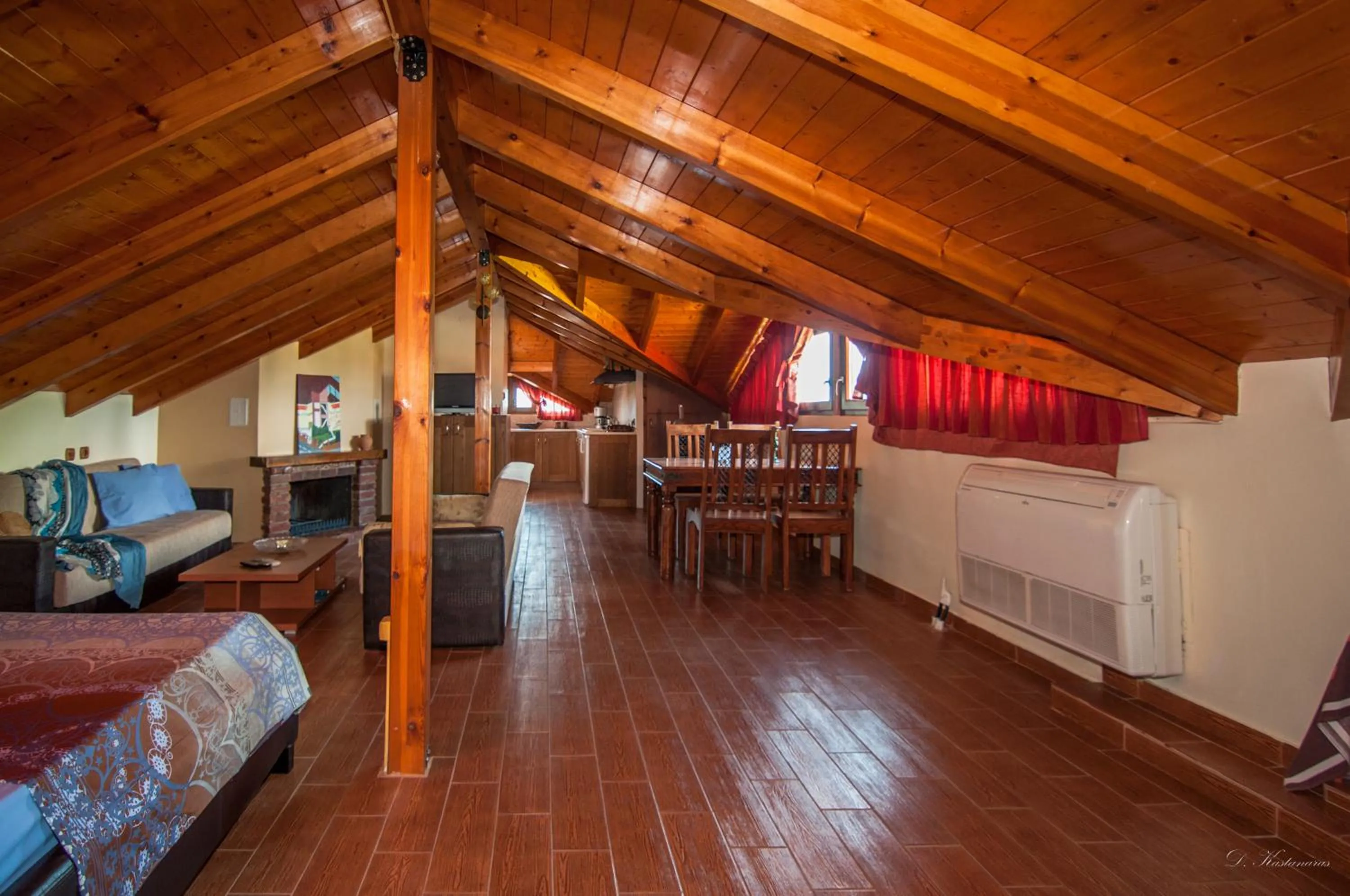 Living room, Bed in Nostos Apartments